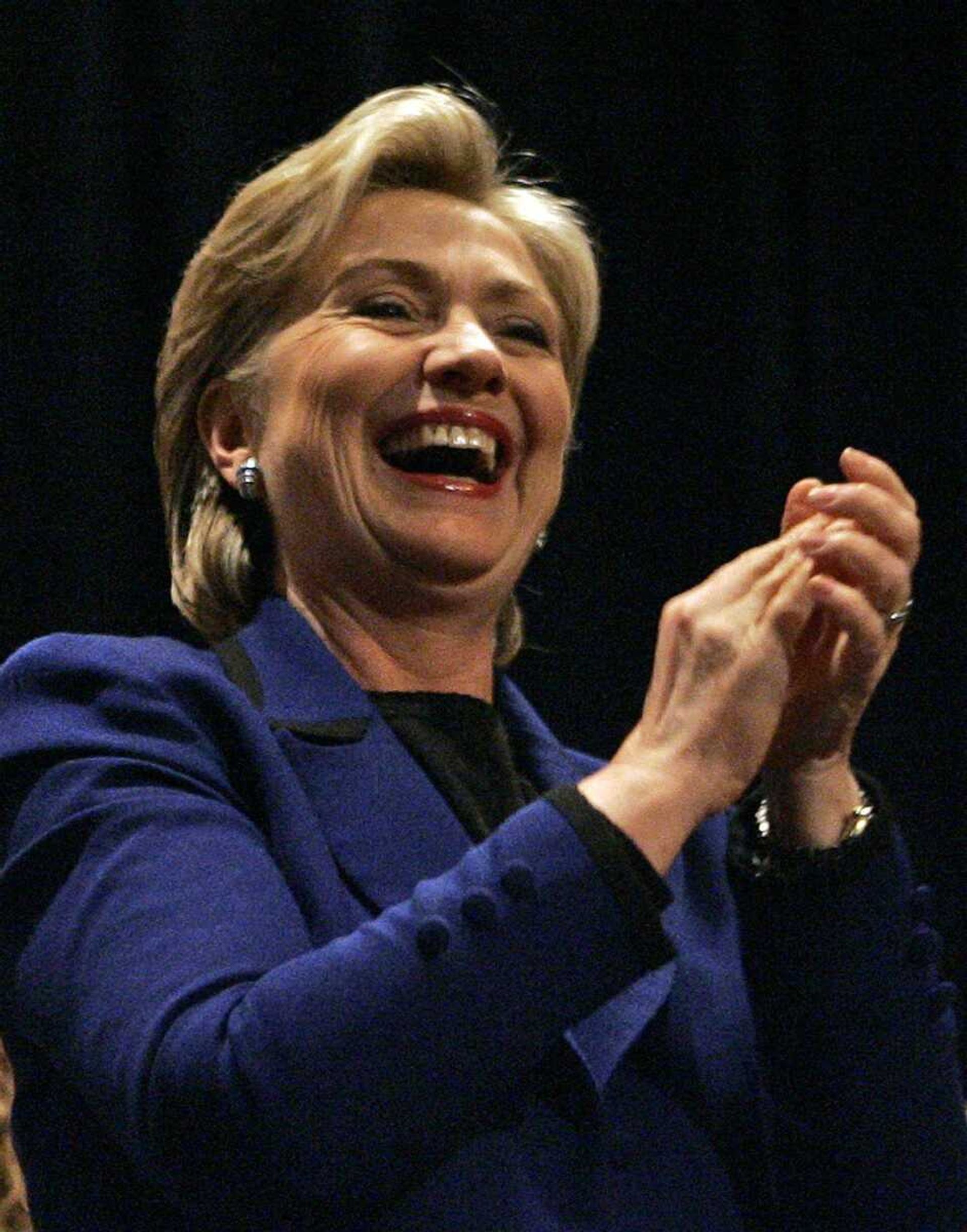 Democratic presidential hopeful Sen. Hillary Rodham Clinton, D-N.Y., reacts as she takes the stage at a rally in Salem, N.H., Monday, Jan. 7, 2008. (AP Photo/Elise Amendola)