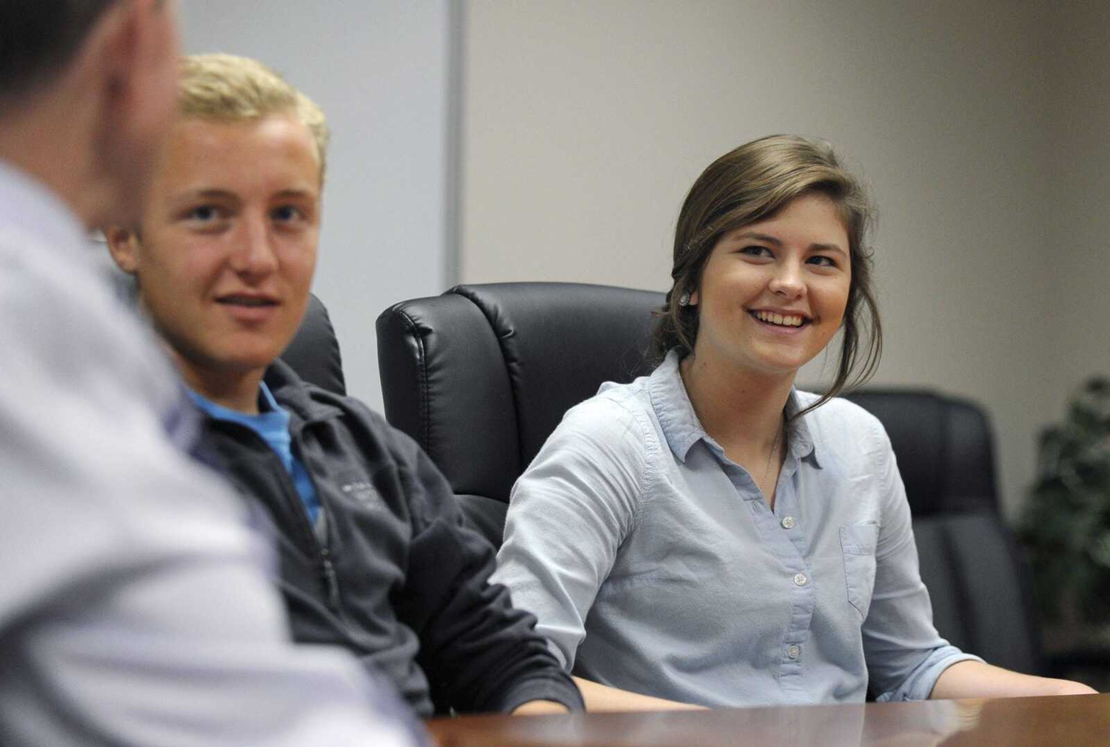 Mackenzie Cannon and Luke Kinder talk with Cape Central principal Mike Cowan about their college plans Oct. 22 at Cape Girardeau Central High School. (Glenn Landberg)