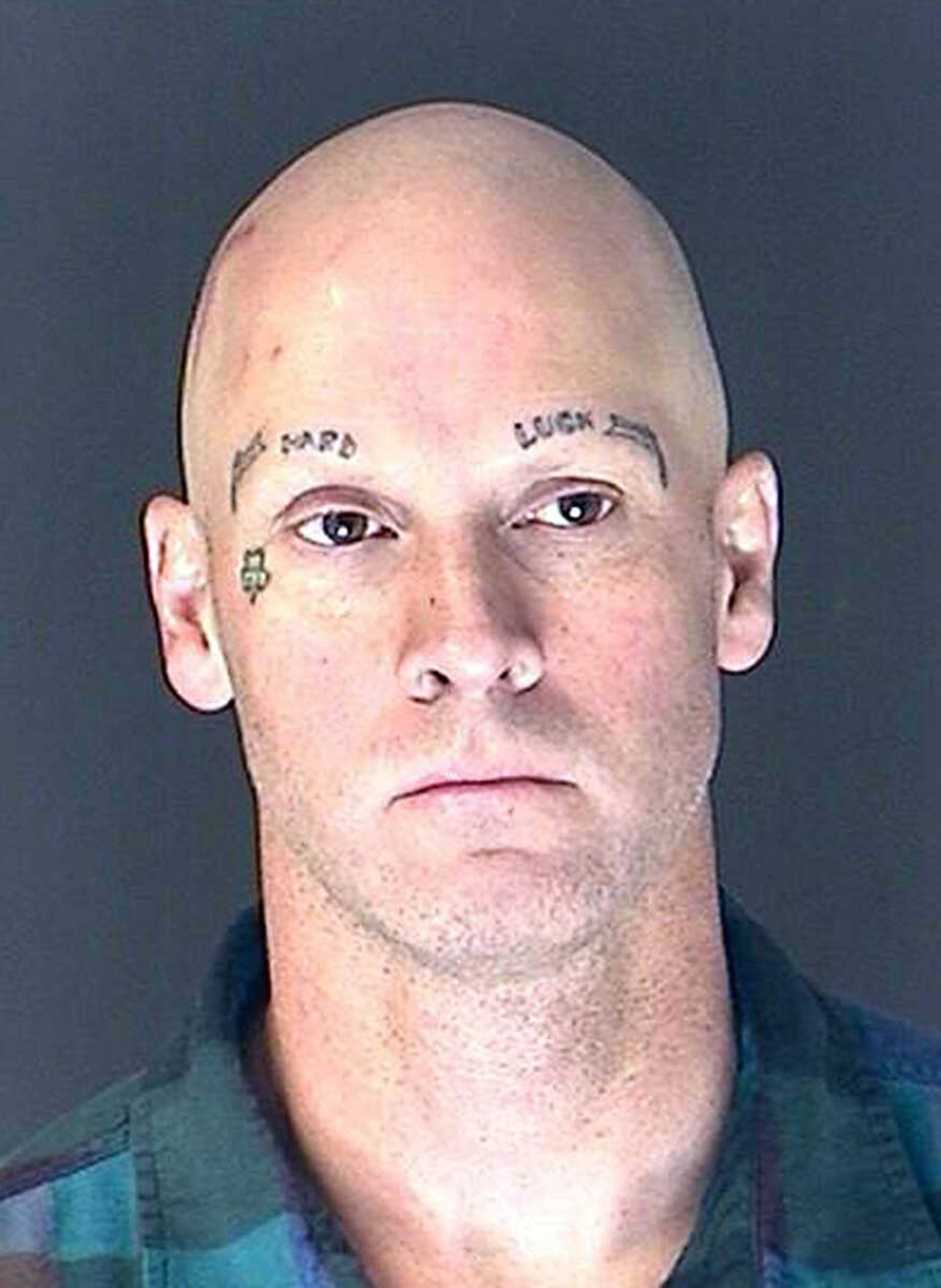 This Friday, April 5, 2013 photo provided by the El Paso County Sheriff's Office shows 47-year-old James Lohr. Lohr, a white supremacist prison gang member, was arrested and another was still being sought for questioning Friday in the death of Colorado's prisons chief as authorities investigated whether the gang had any ties to the killing.  (AP Photo/El Paso County Sheriff's Office)