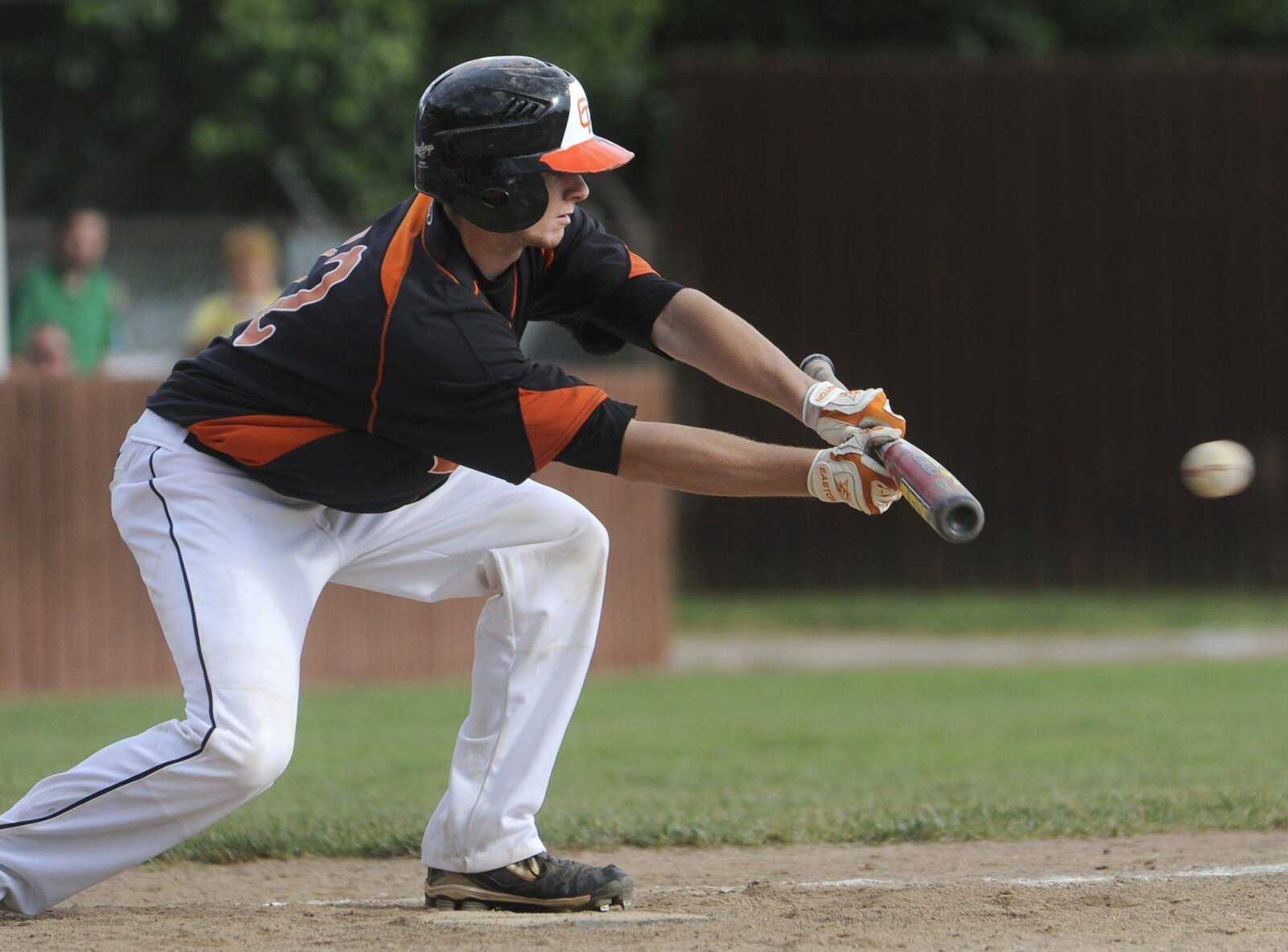 Central's Ryan Siebert sacrifice bunts against Sikeston during last week's Class 4 District 1 title game in Farmington, Mo. (Fred Lynch)