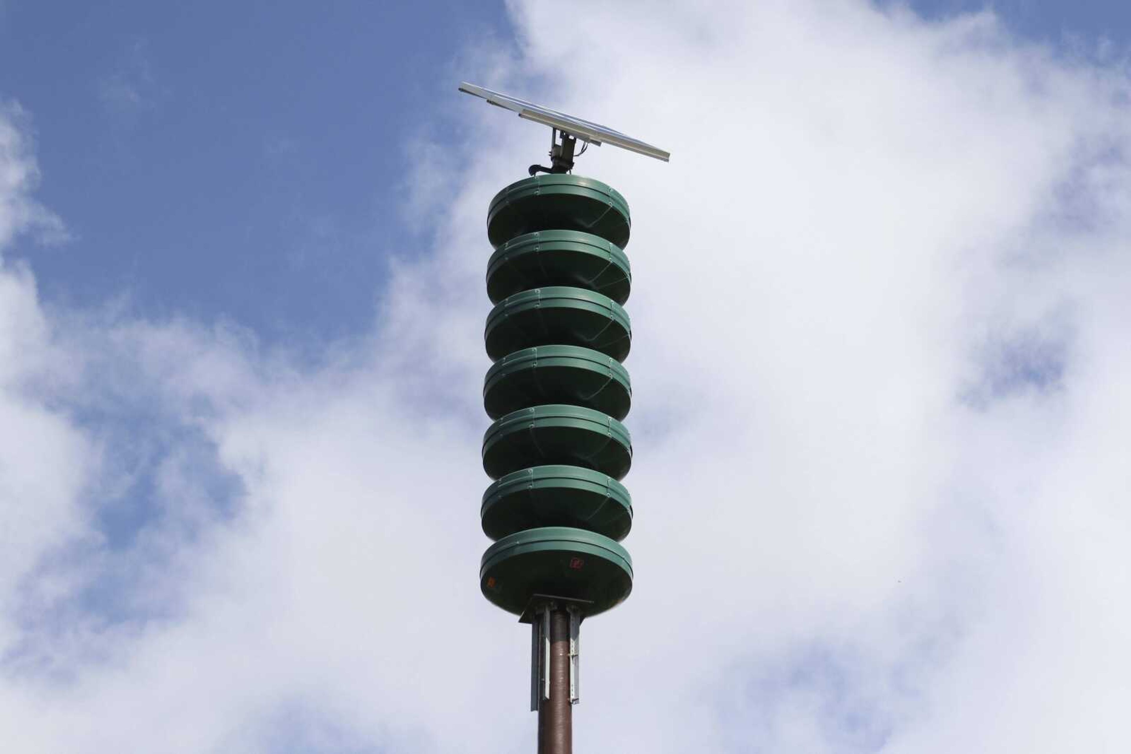 A Hawaii Civil Defense Warning Device, which sounds an alert siren during natural disasters, is shown in Honolulu on Wednesday. The alert system is tested monthly, but on Friday Hawaii residents will hear a new tone designed to alert people of an impending nuclear attack by North Korea. The attack warning will produce a different tone than the long, steady siren sound that people in Hawaii have grown accustomed to. It will include a wailing in the middle of the alert to distinguish it from the other alert, which is generally used for tsunamis. (AP Photo/Caleb Jones)