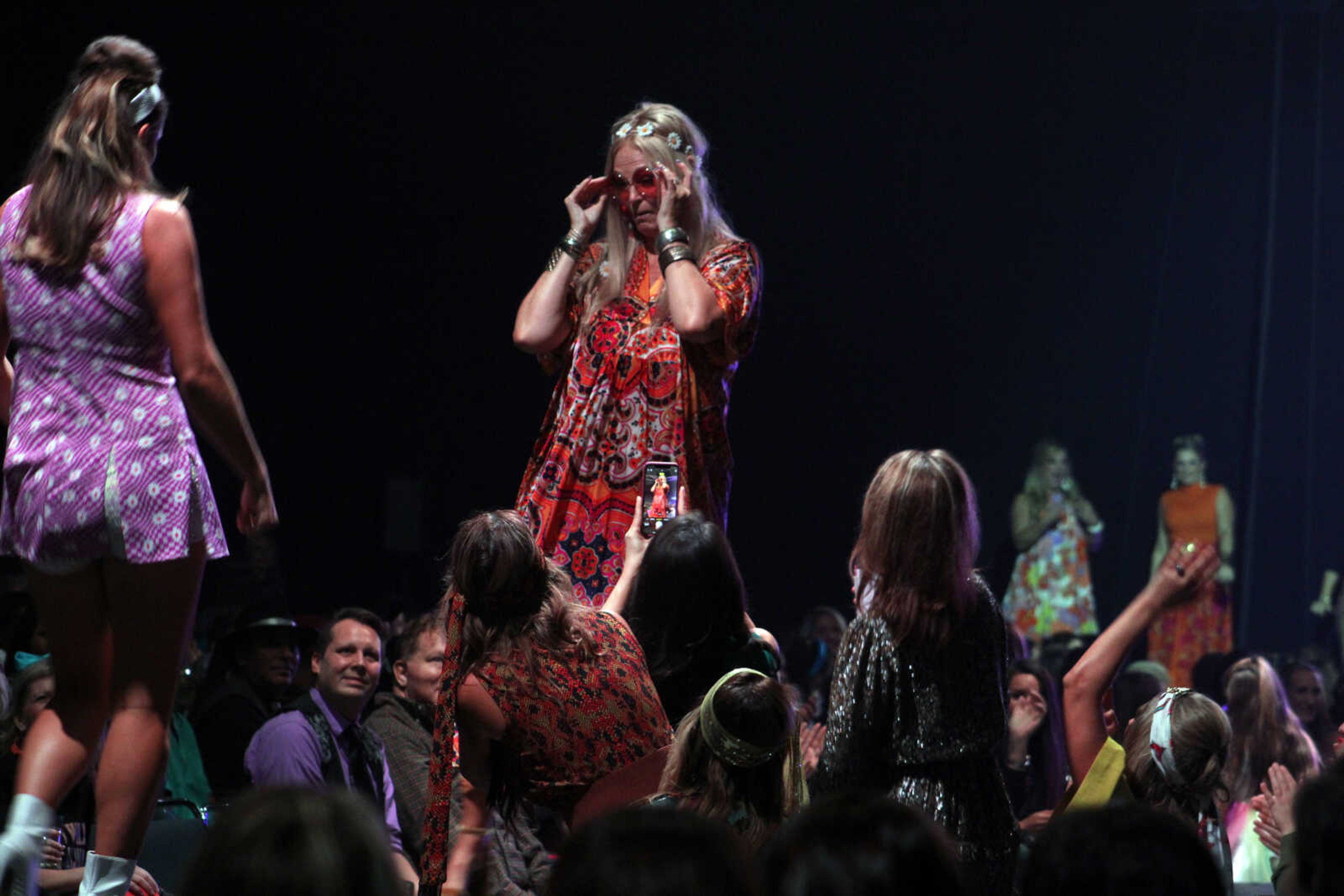 Community women perform as models and dancers in the 11th VintageNOW fashion show Saturday, Oct. 9, 2021, at the Show Me Center in Cape Girardeau.