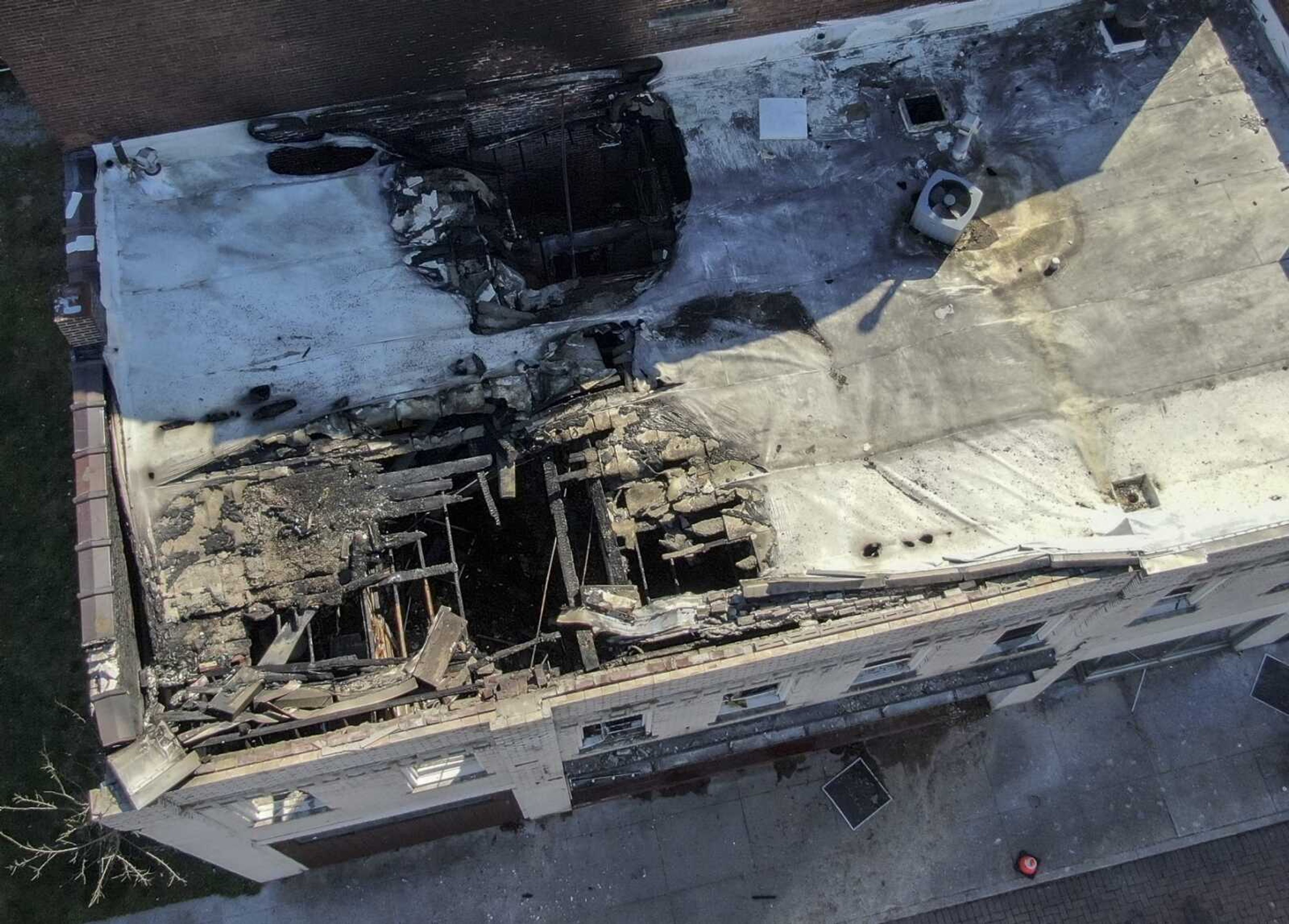 The former Broadway Theatre building has roof damage from Wednesday's fire, as seen from above Thursday in Cape Girardeau.