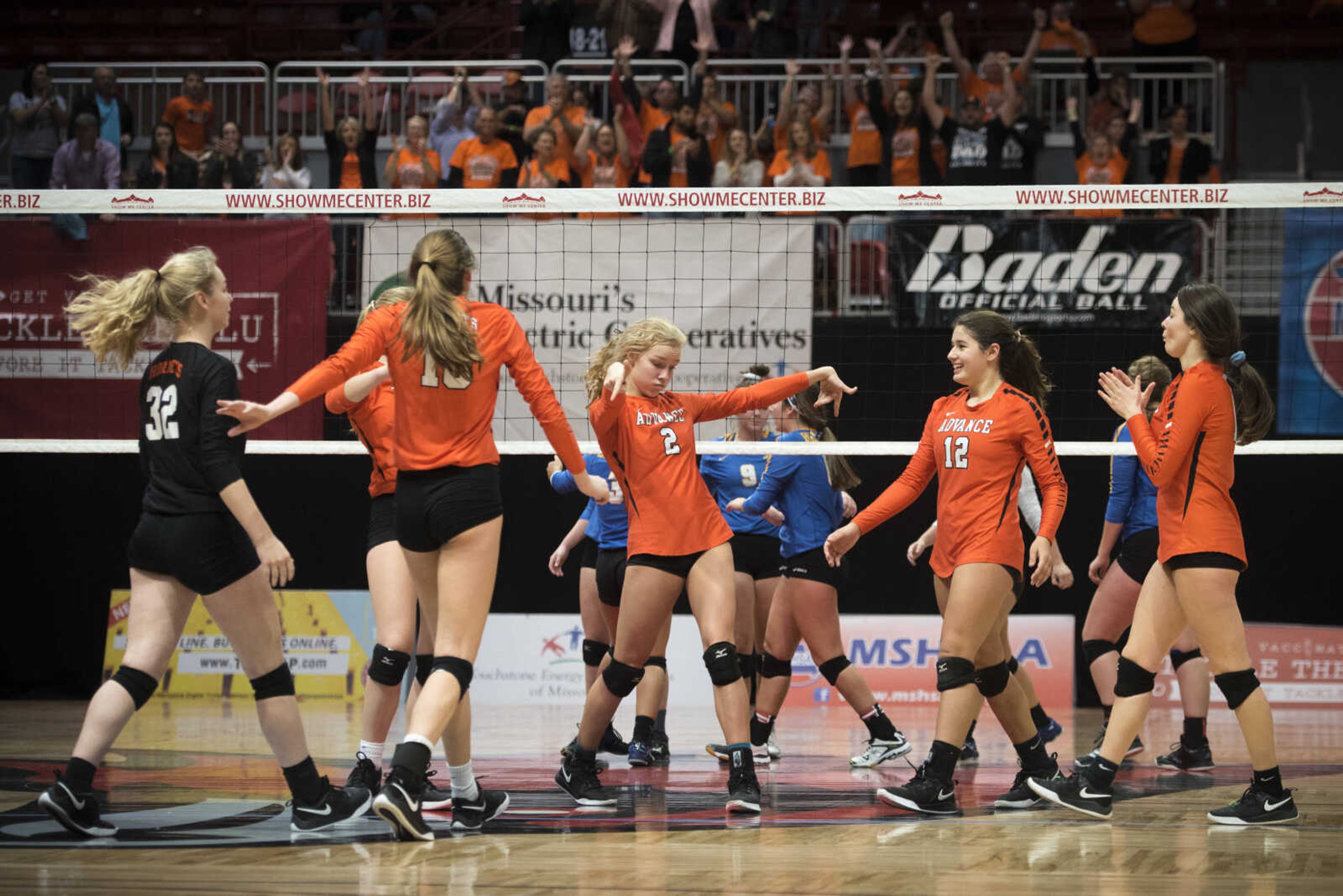 Advance players celebrate after scoring a game point to win their second game against Billings in round robin play of the Class 1 volleyball state championships Friday, Nov. 2, 2018, at the Show Me Center in Cape Girardeau.