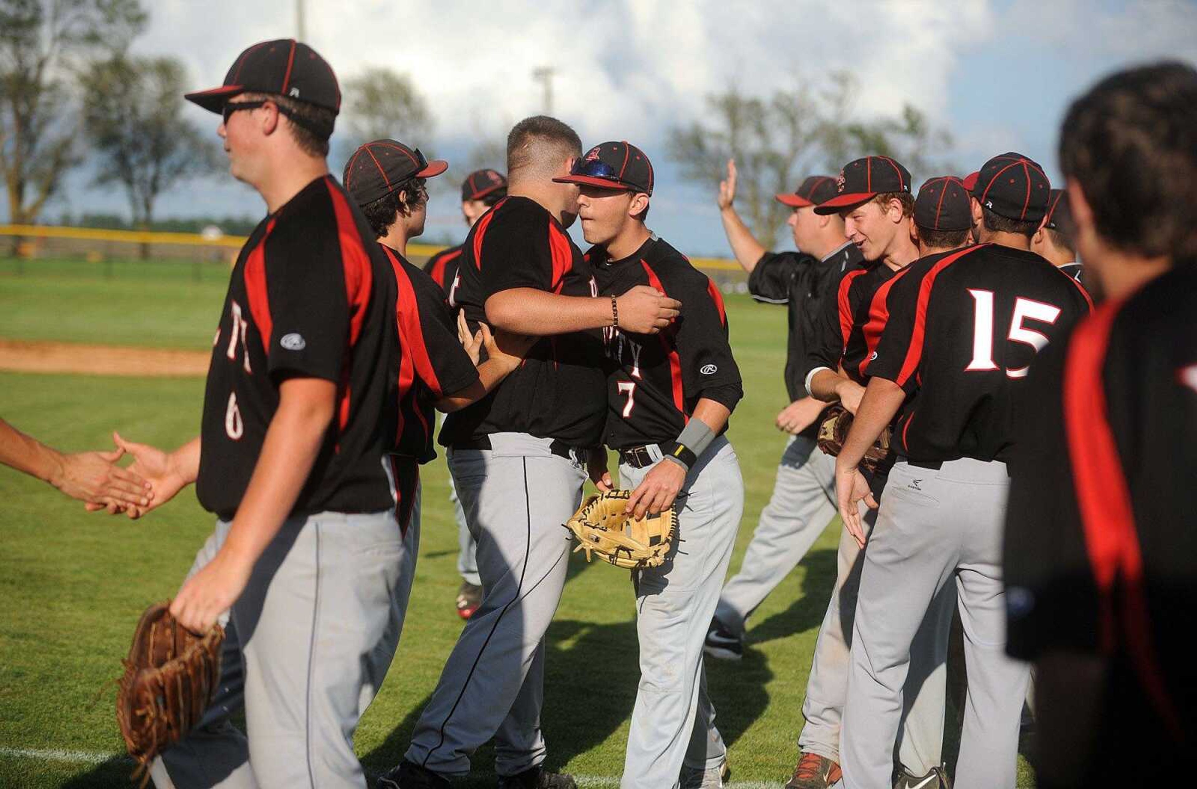 Bell City players celebrate their 9-0 Class 1 sectional win against Gideon, Monday, May 25, 2015. (Laura Simon)