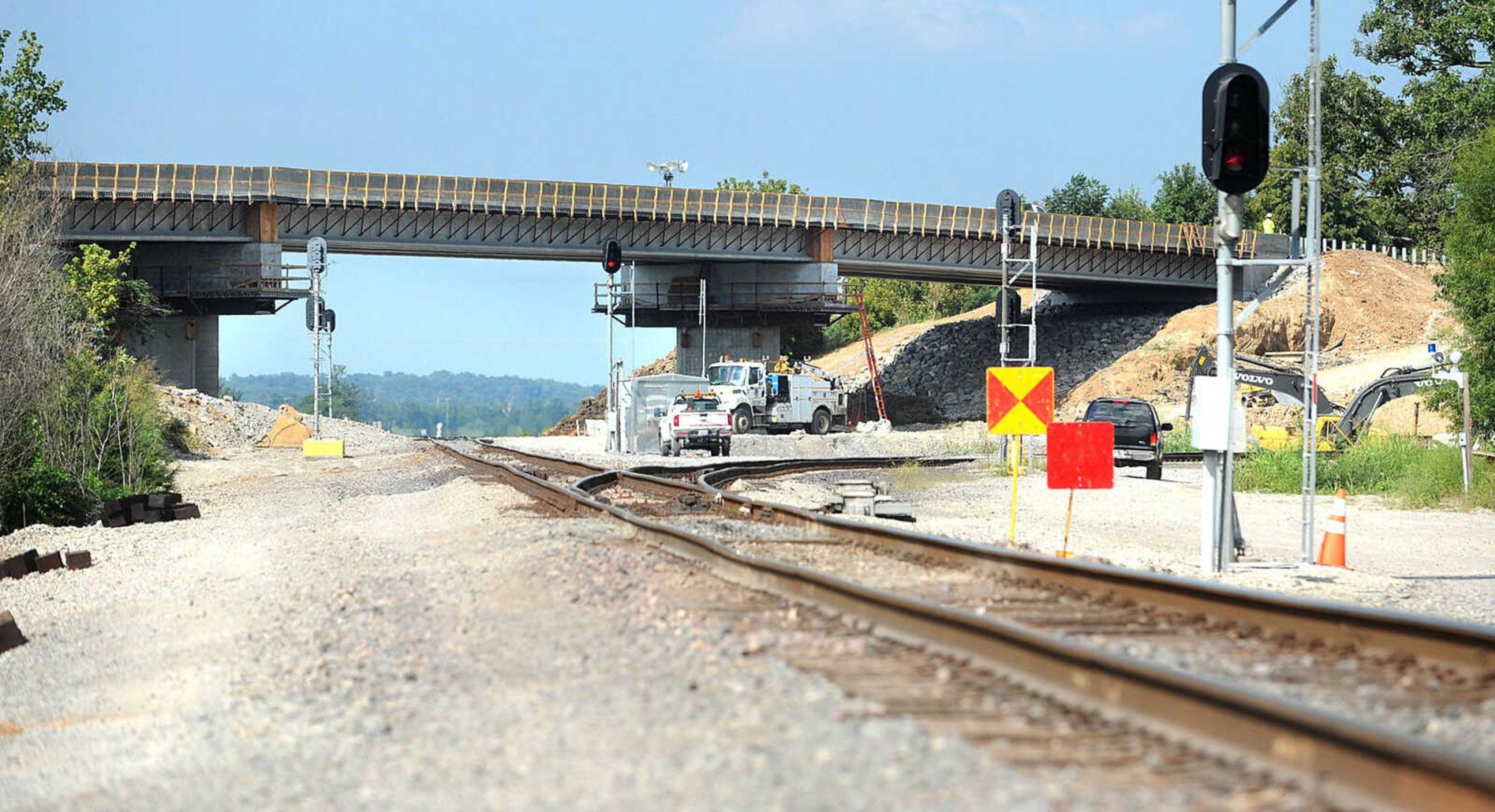 The finishing touches are being added to the new Route M overpass, Wednesday, Aug. 28, 2013 in Rockview, Mo. A train collision partially collapsed the overpass in May. The Route M overpass is set to open Friday at noon. (Laura Simon)