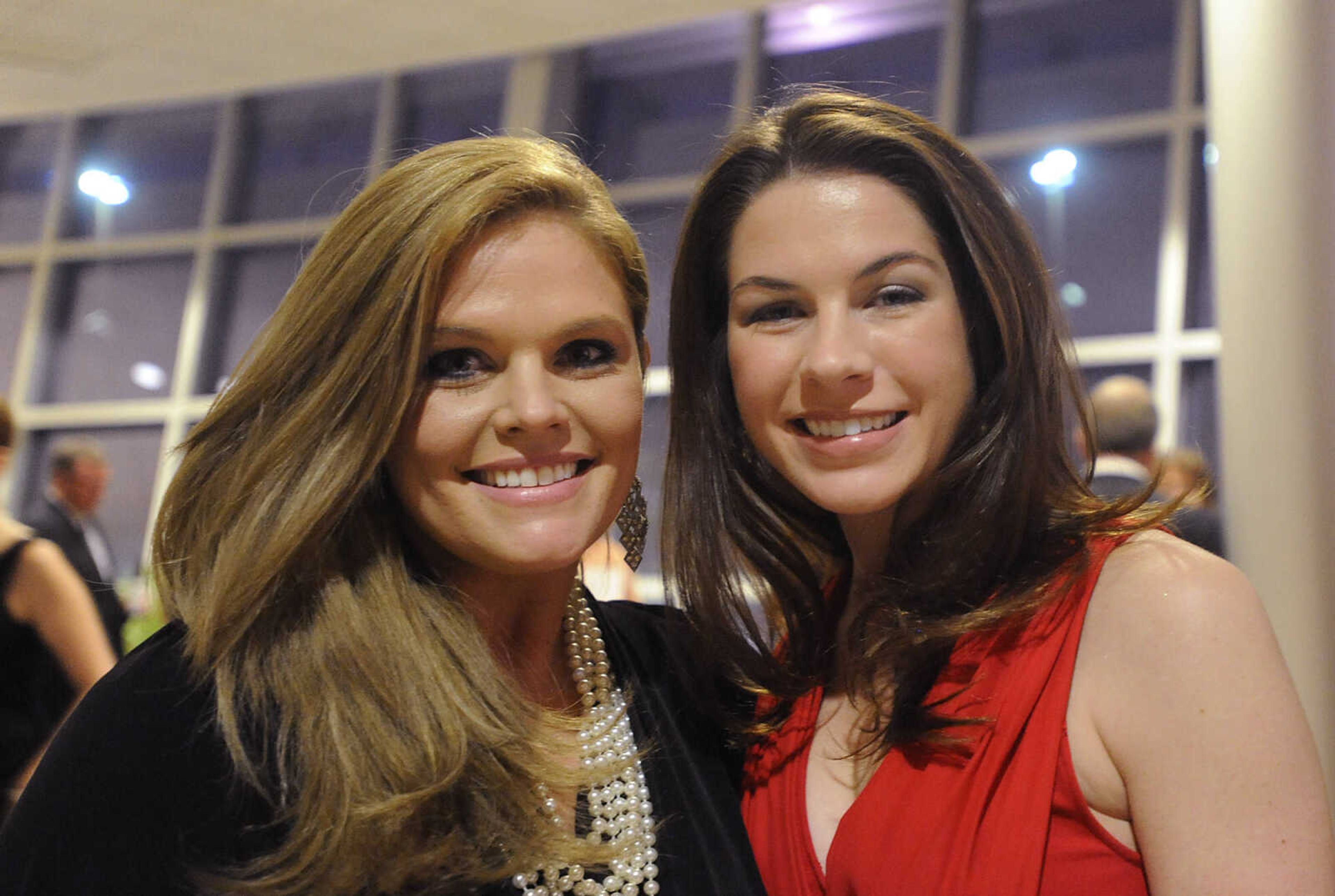 Tailor Institute Executive Director Jenny Knoderer, left, and Julianna Ford at a black tie fundraiser for the institute Saturday, October 27, at the Southeast Cancer Center. The Tailor Institute helps individuals diagnosed with autism identify and use their special skills and learn to work and live independently. Dr. David Crowe, whose son Taylor is high-function on the autism spectrum, founded the institute in 2003.