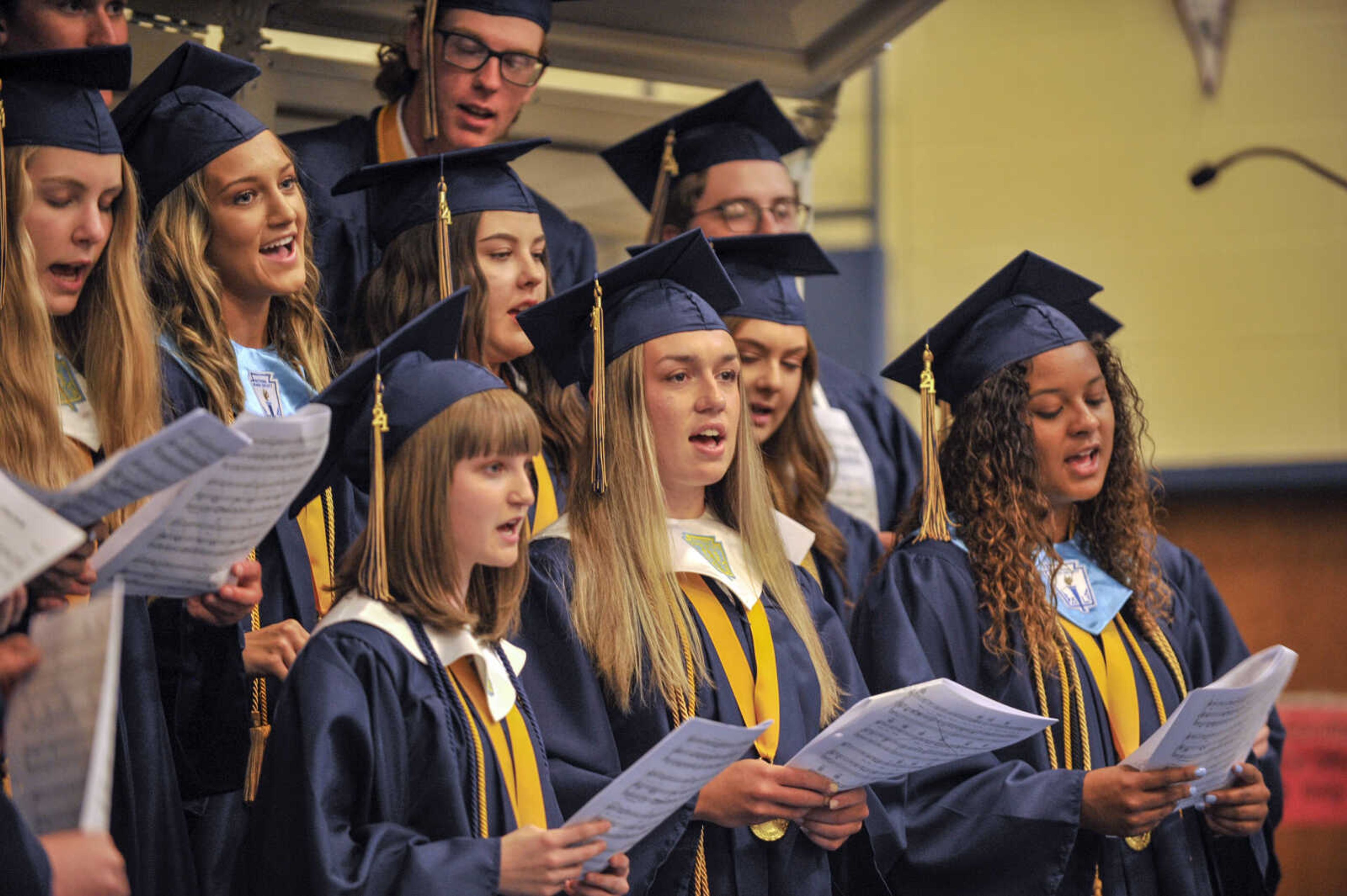 Saxony Lutheran High School graduates sing "It's a Great Day to Be Alive" by Travis Tritt during commencement at Saxony Lutheran High School on Sunday, May 16, 2021.