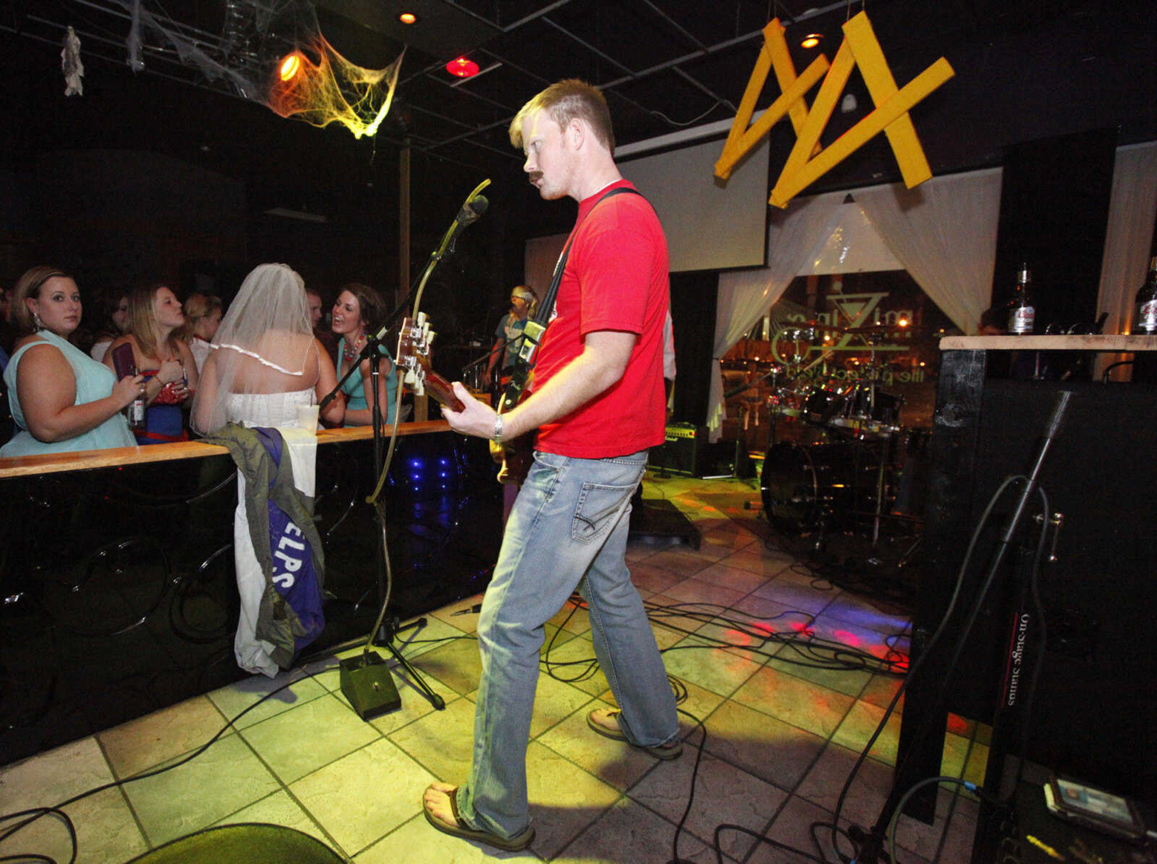 CHRIS MACKLER ~ photos@semissourian.com

A band plays in Mixing 10 in Cape Girardeau on Saturday, Oct. 30, 2010.