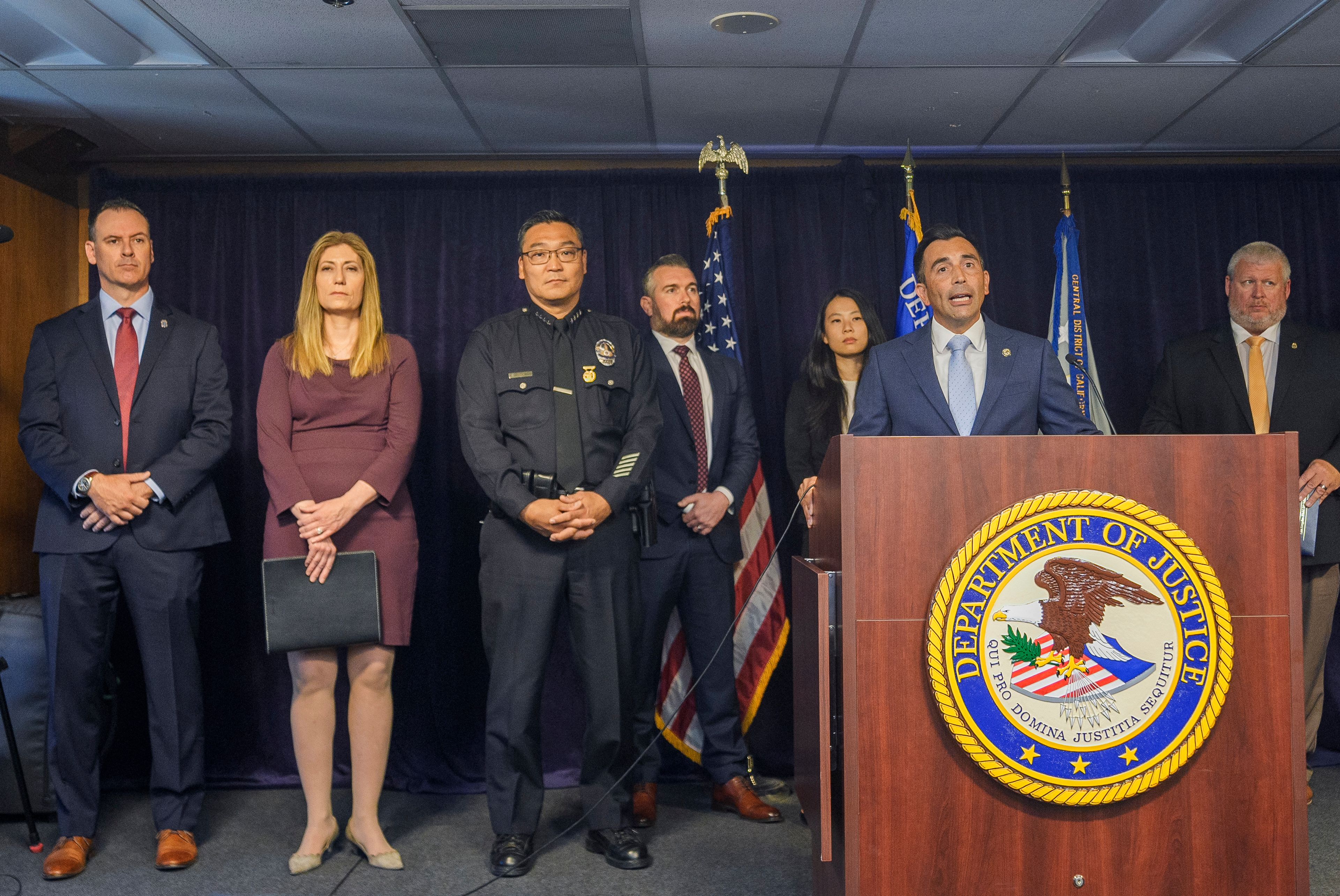 United States Attorney Martin Estrada, at podium, is joined by officials from left: Acting Inspector in Charge of the U.S. Postal Inspection Service's Los Angeles Division, Matthew Shields, Los Angeles Police Chief Dominic Choi, DEA Administrator Anne Milgram, and other officials to announce court filings related to the death of actor Matthew Perry in Los Angeles on Thursday, Aug. 15, 2024. (AP Photo/Damian Dovarganes)