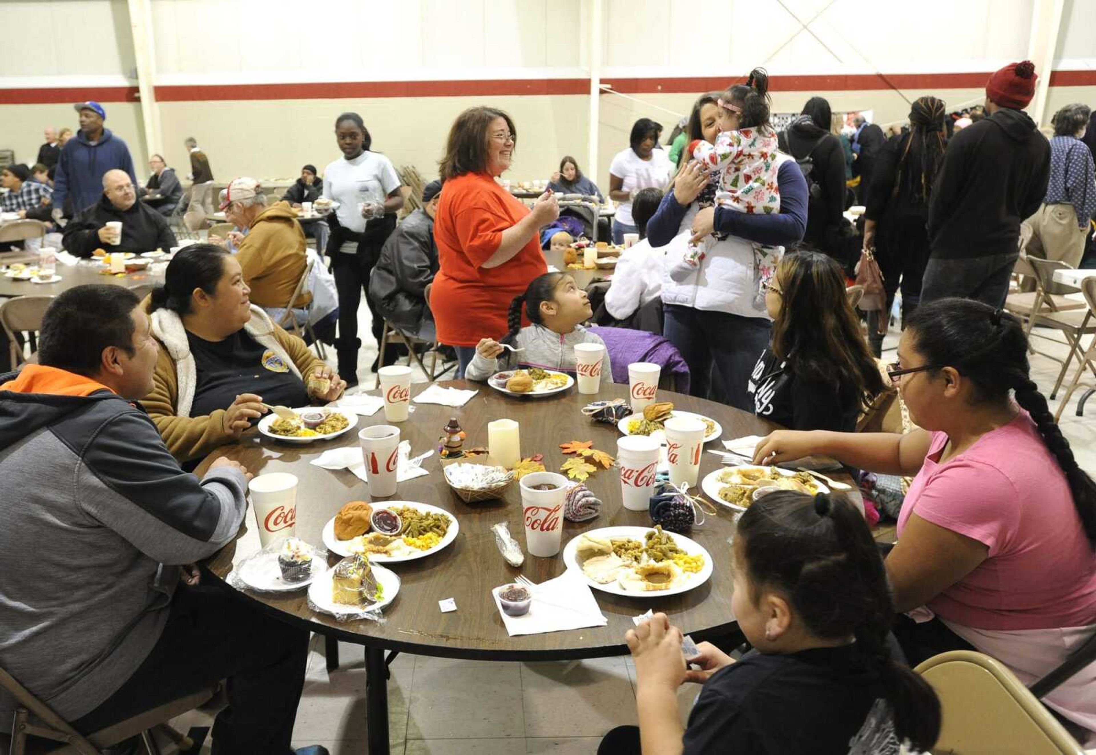 People gather Thursday, Nov. 23, 2017, for the Thanksgiving Day luncheon at the Salvation Army in Cape Girardeau.