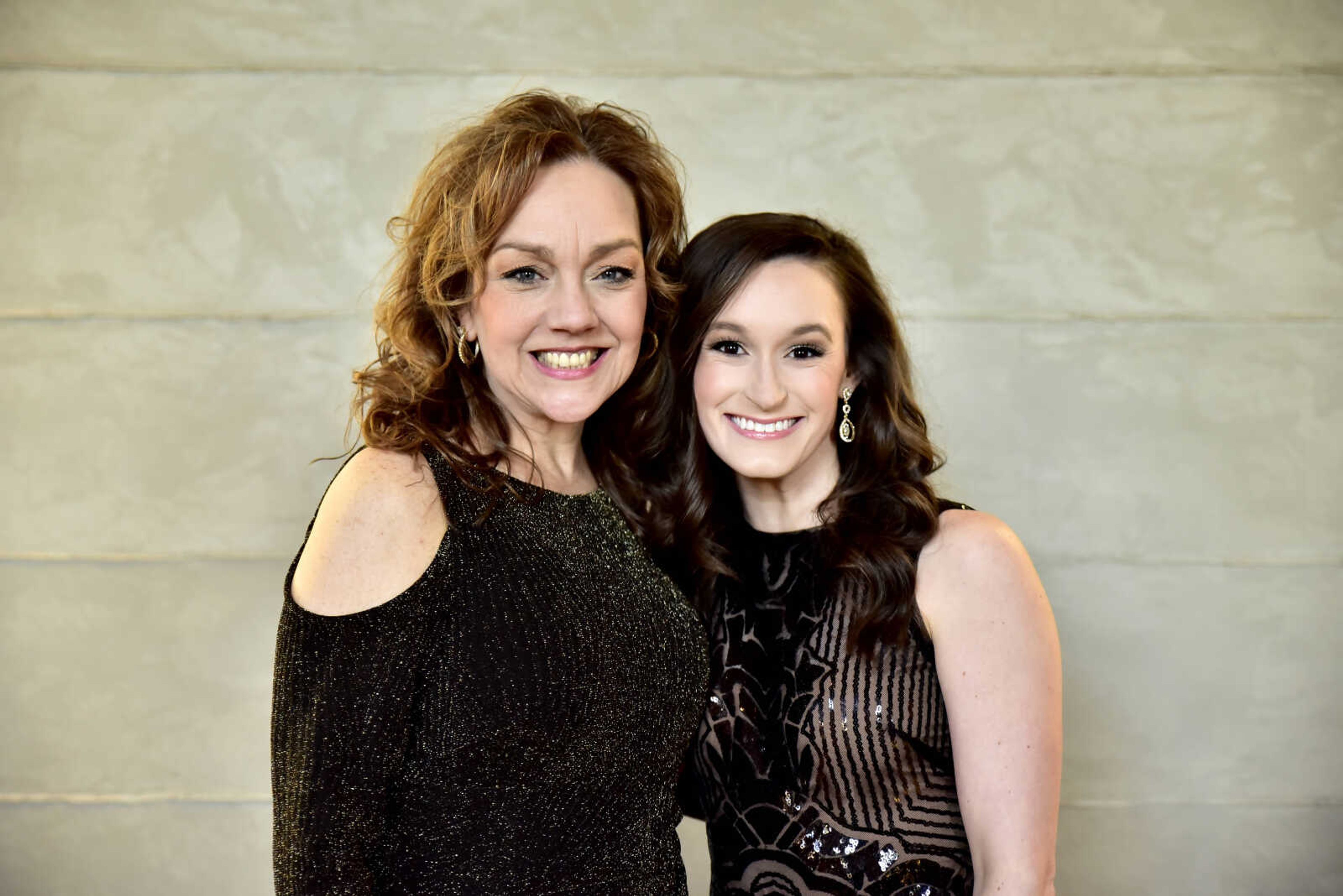 Lorili Ozbun and Ashten Hesselrode post for a photo at the third annual Friends of Saint Francis Gala held at the Isle Casino on March 3, 2018, in Cape Girardeau.