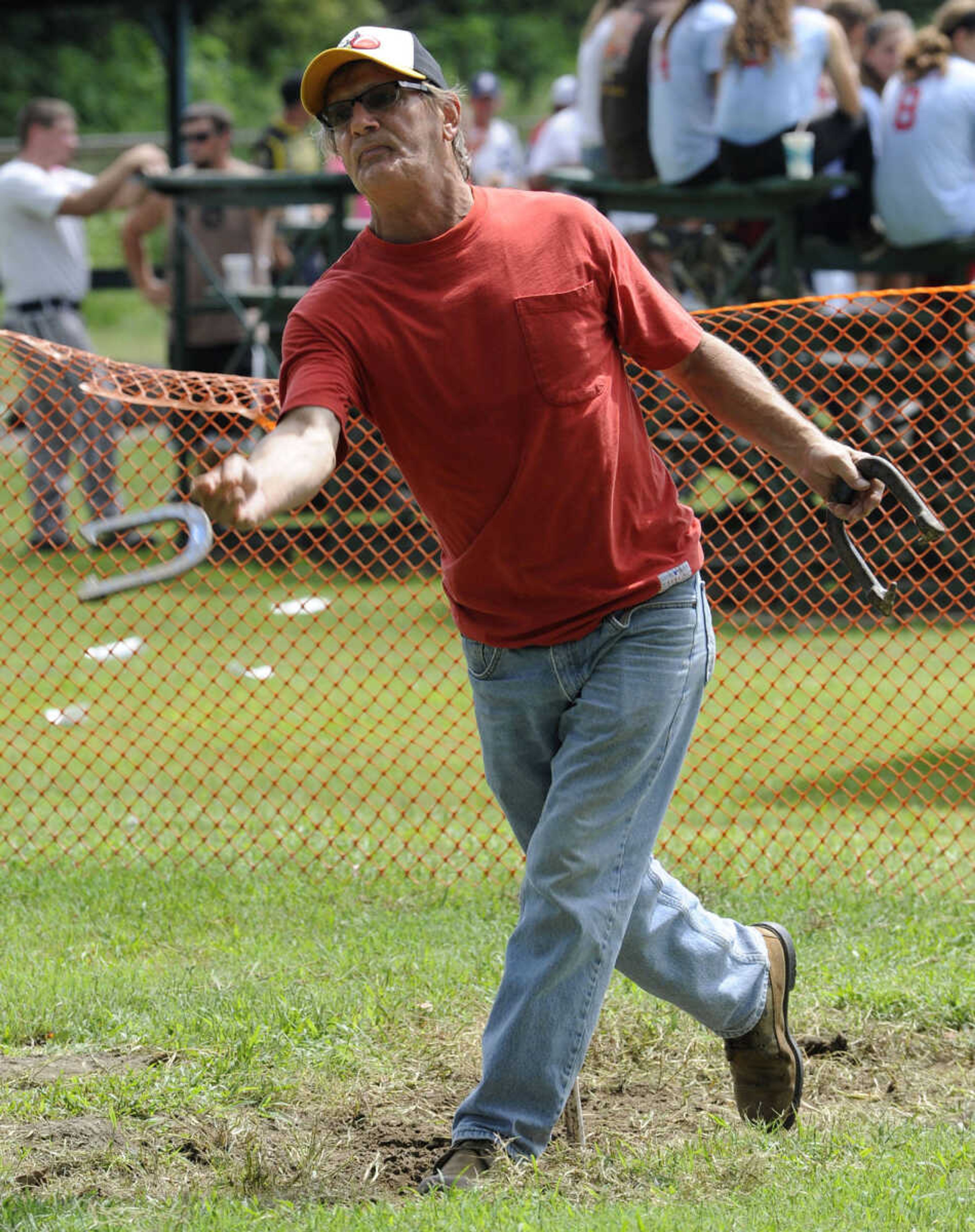 FRED LYNCH ~ flynch@semissourian.com
J.D. Tollison pitches a horseshoe during a tournament at German Days on Saturday, Aug. 9, 2014 at Frisco Park in Chaffee, Missouri.