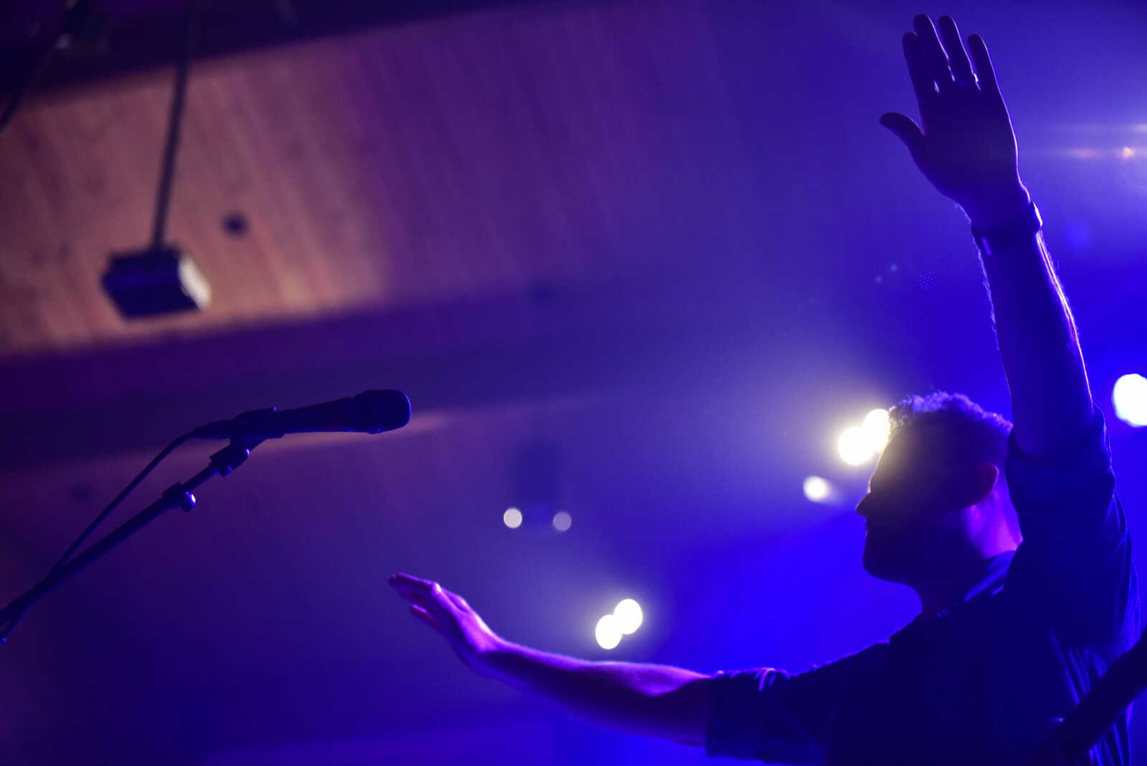 Jeremy Redmon prays with the audience during a Big Daddy Weave concert Wednesday, March 14, 2018, at Cape Bible Chapel in Cape Girardeau.