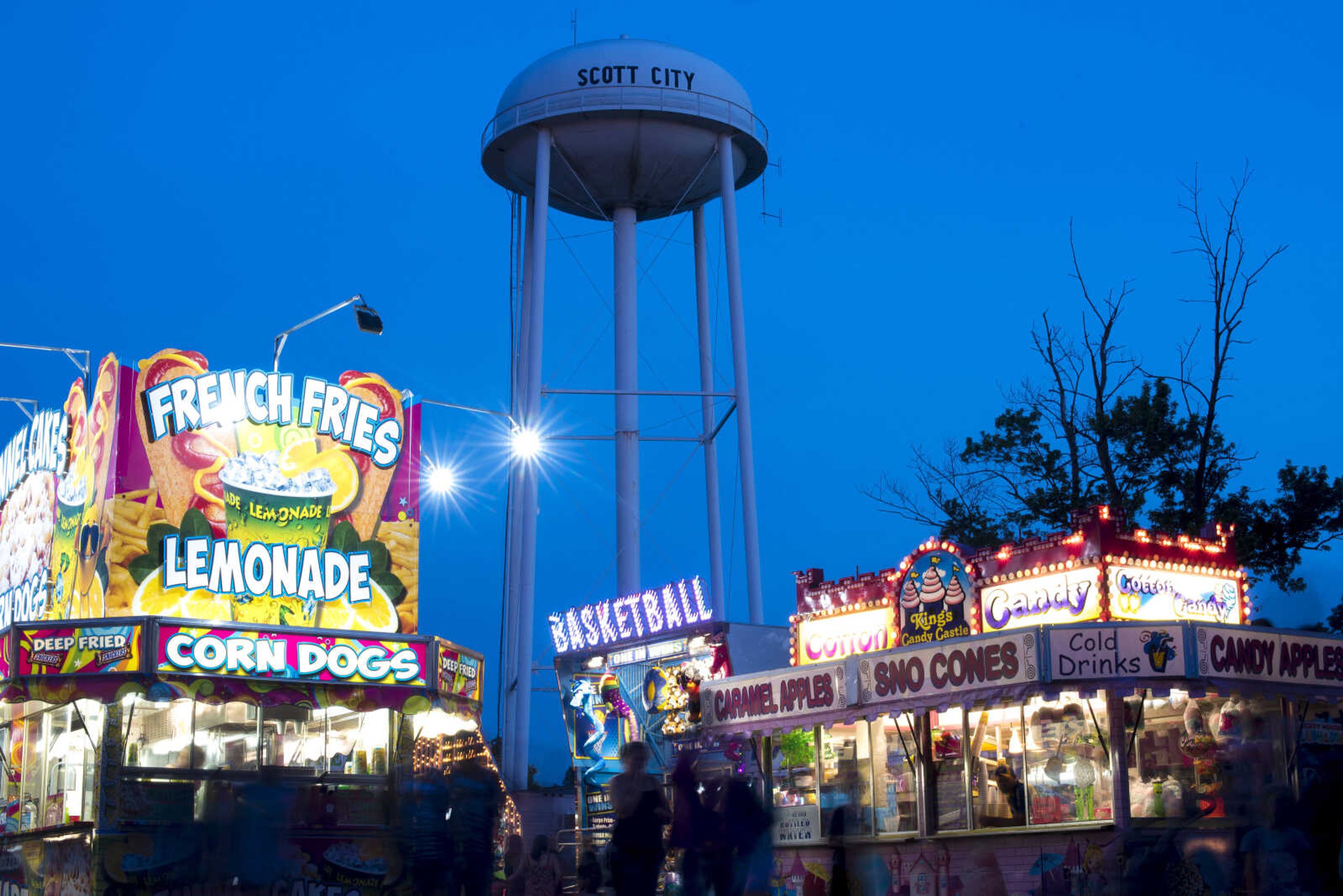 The sun sets during the 41st annual Mid-Summer Festival Saturday, June 17, 2017 at Scott City Park.