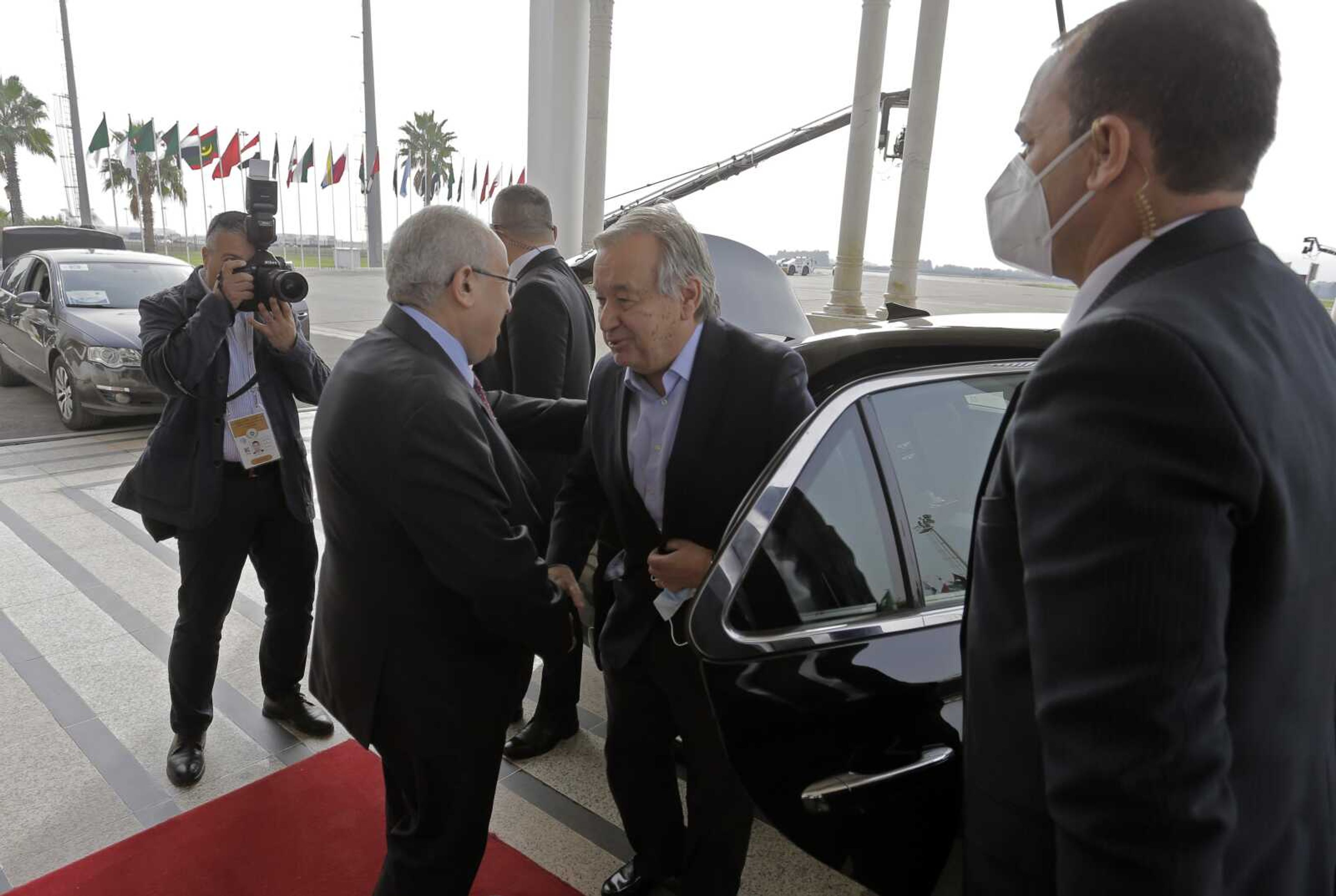 Algerian Foreign Minister Ramtane Lamamra receives United Nations Secretary General Antonio Guterres as he arrives Tuesday to participate in the Arab Summit as a guest of honor, in Algiers, Algeria.