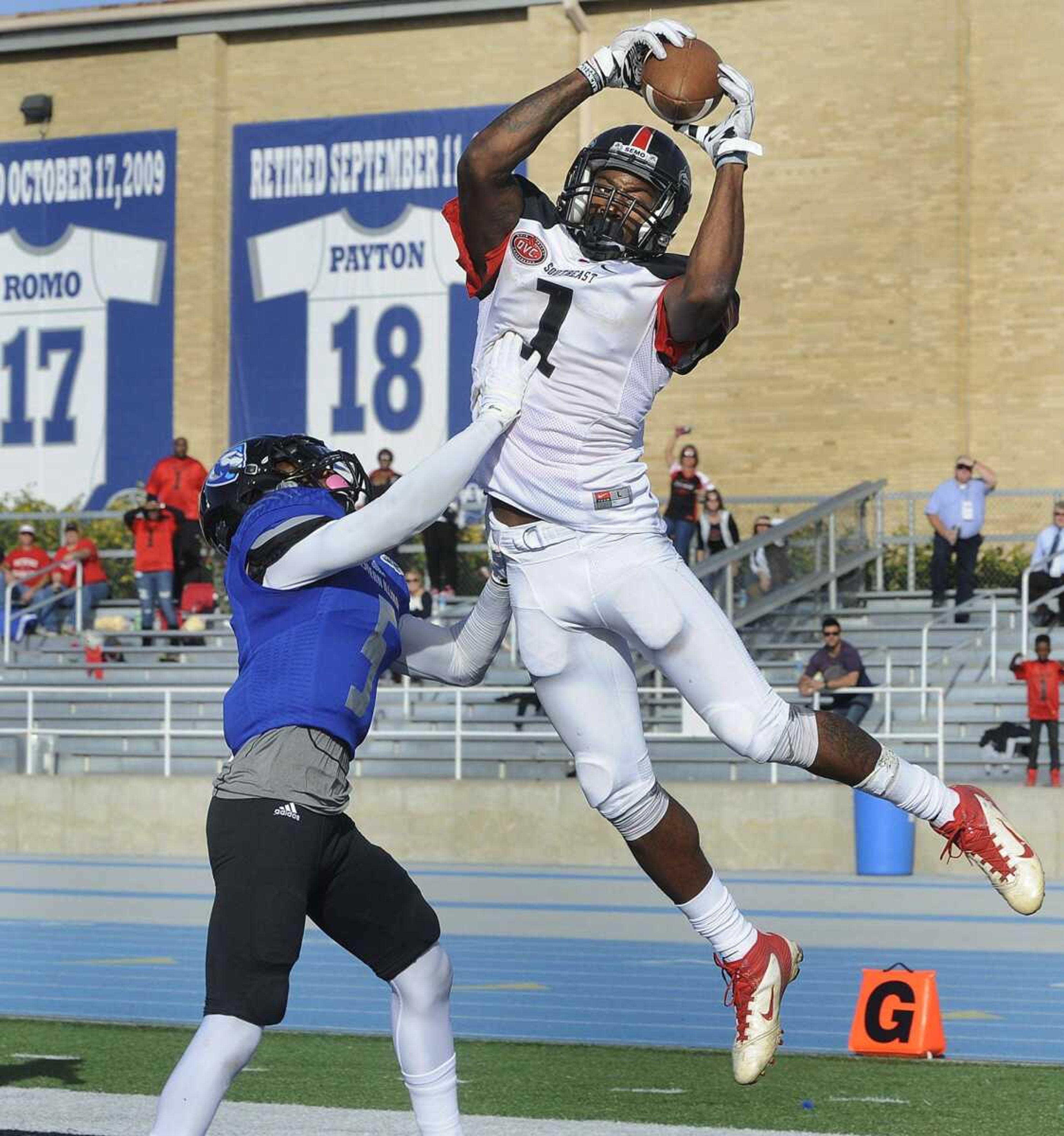 Southeast Missouri State's Paul McRoberts hauls in an 8-yard pass from Dante Vandeven above Eastern Illinois  Antoine Johnson for a touchdown during the fourth quarter Saturday, Oct. 10, 2015 in Charleston, Illinois. (Fred Lynch)