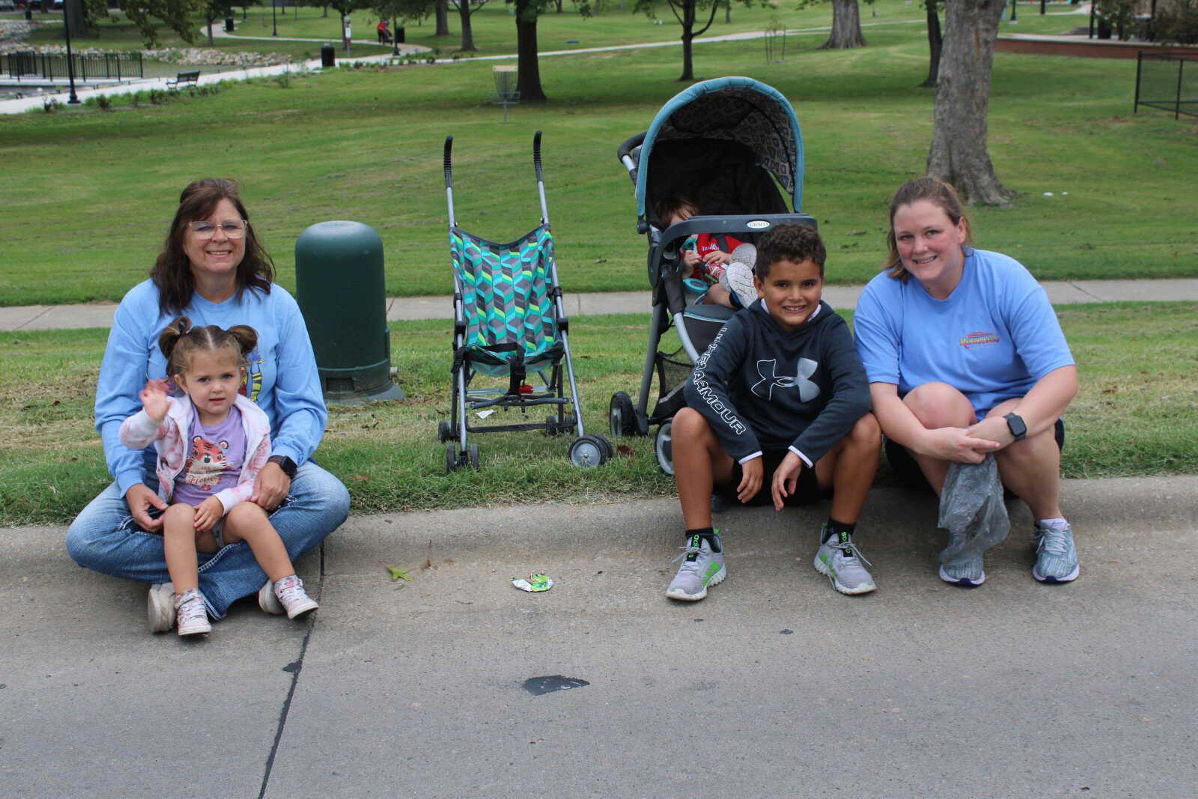 The Lindsey family gather together to watch the parade.