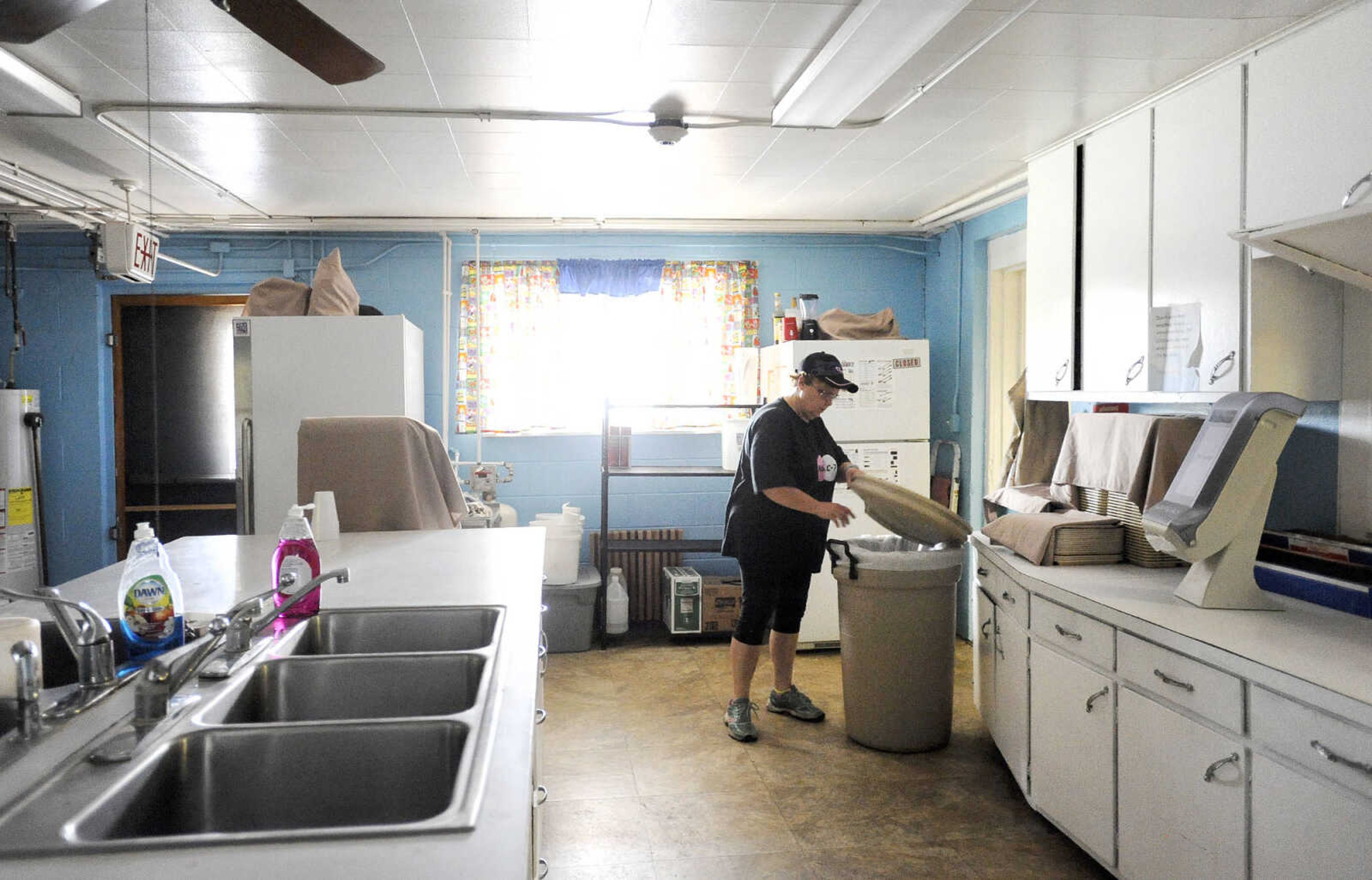 LAURA SIMON ~ lsimon@semissourian.com

Laura Orr tidy's up in the basement kitchen of Kelso C-7 School in New Hamburg, Missouri on Thursday, July 14, 2016. Orr has worked at the school for 29 years as a bus driver and cook.