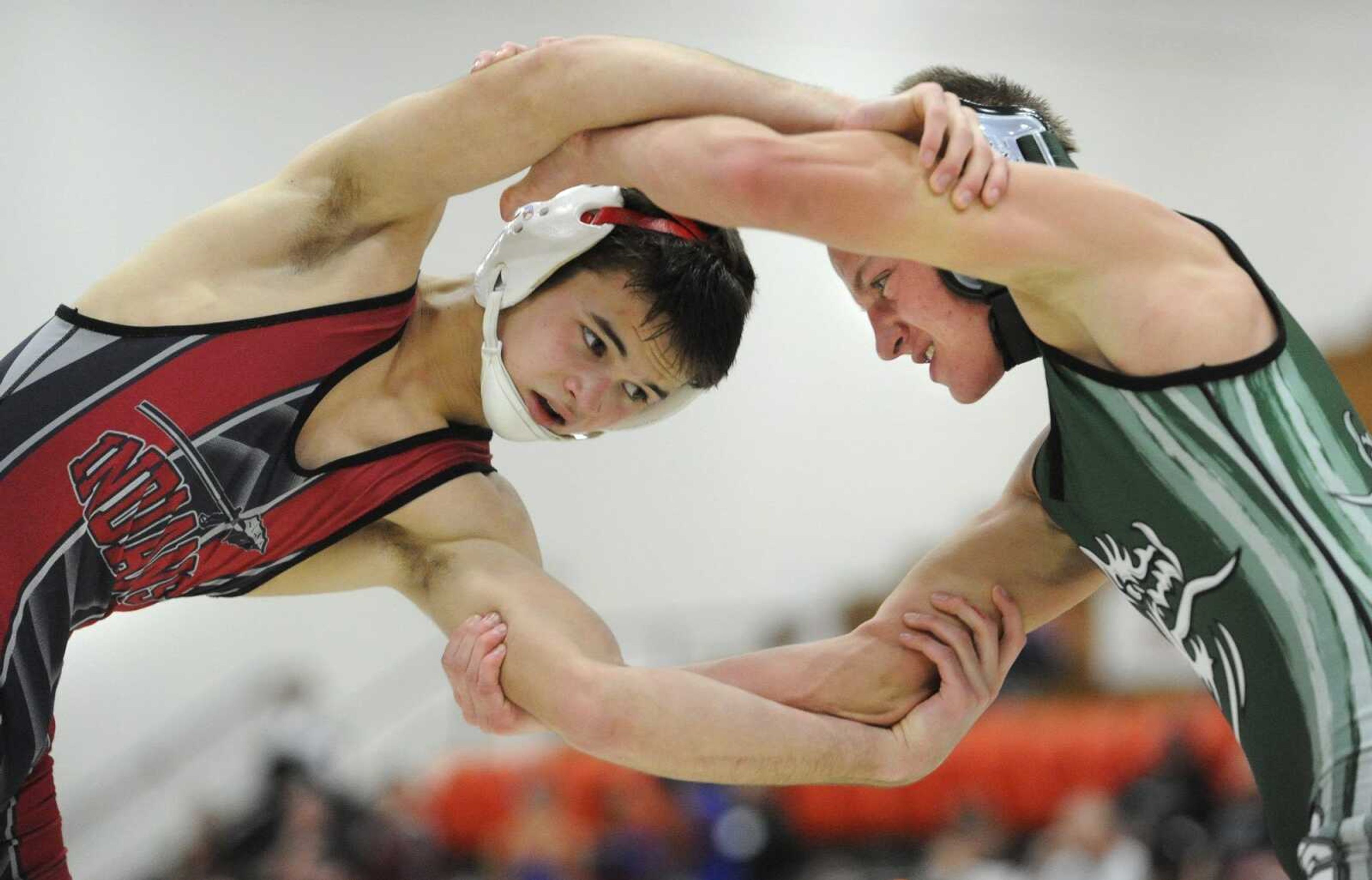 Jackson's Jarrett Reisenbichler, left, and Ste. Genevieve's Ryan Grieshaber battle for control in their 106-pound title match Saturday.