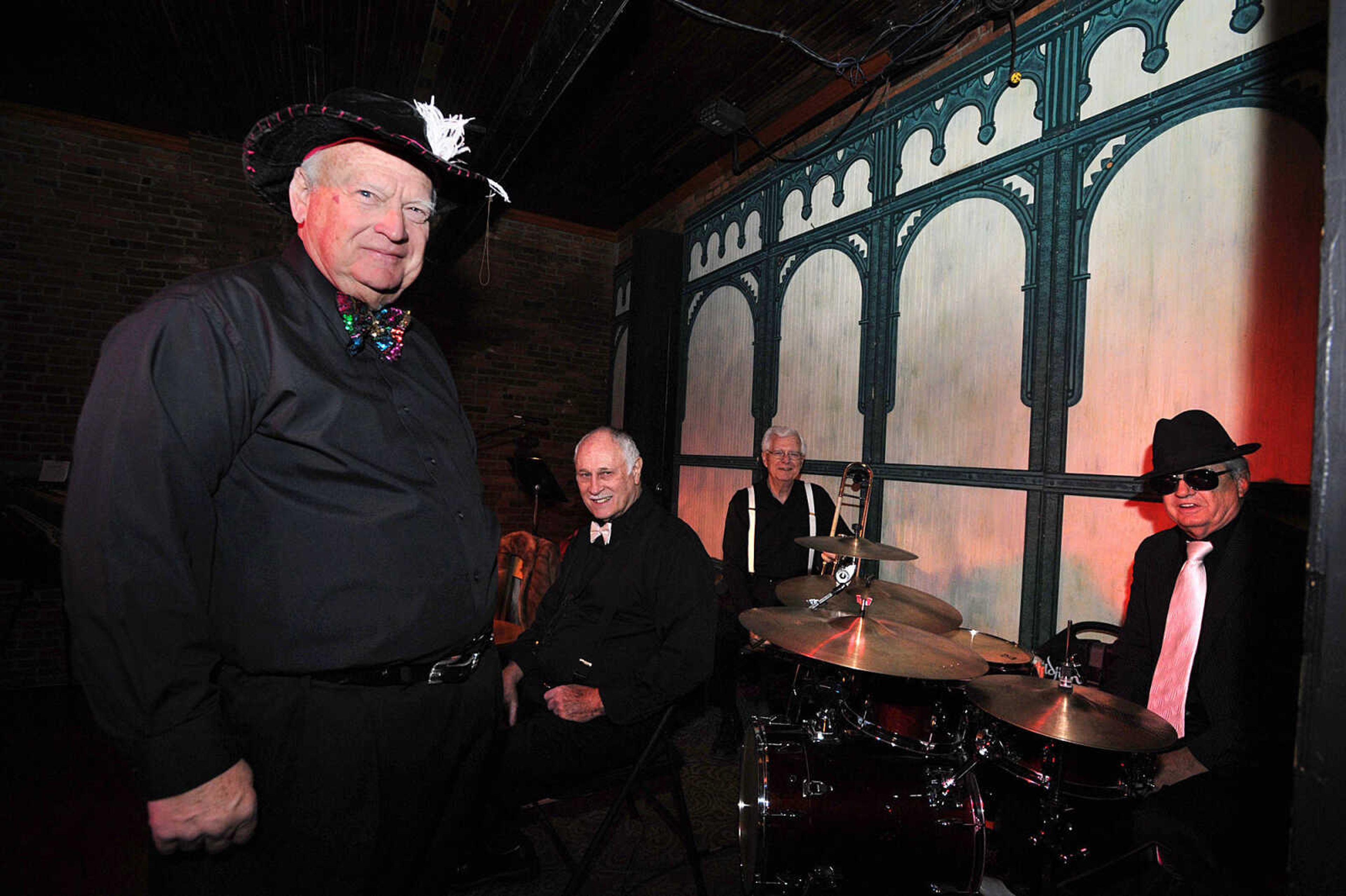 LAURA SIMON ~ lsimon@semissourian.com
Jerry Ford and his orchestra pose for a photo Friday, Nov. 30, 2012 during CASA's Speakeasy Soiree at Port Cape's Yacht Club in Cape Girardeau.