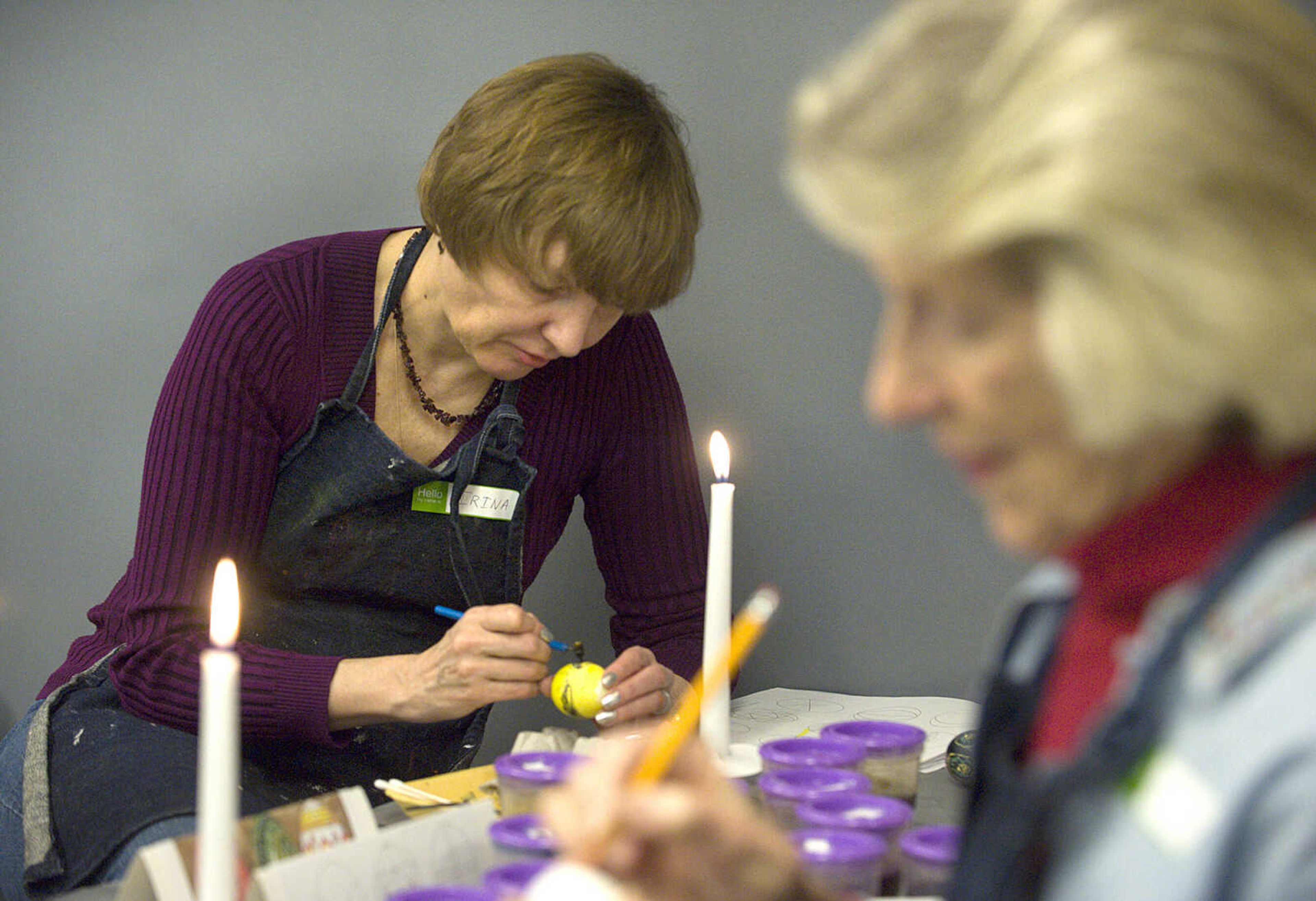 LAURA SIMON ~ lsimon@semissourian.com
Irina Stallion, left, and Judy Holcomb decorate their eggs Tuesday, March 19, 2013 during the Wonderful World of Pysanky workshop at Southeast Missouri State University's River Campus.