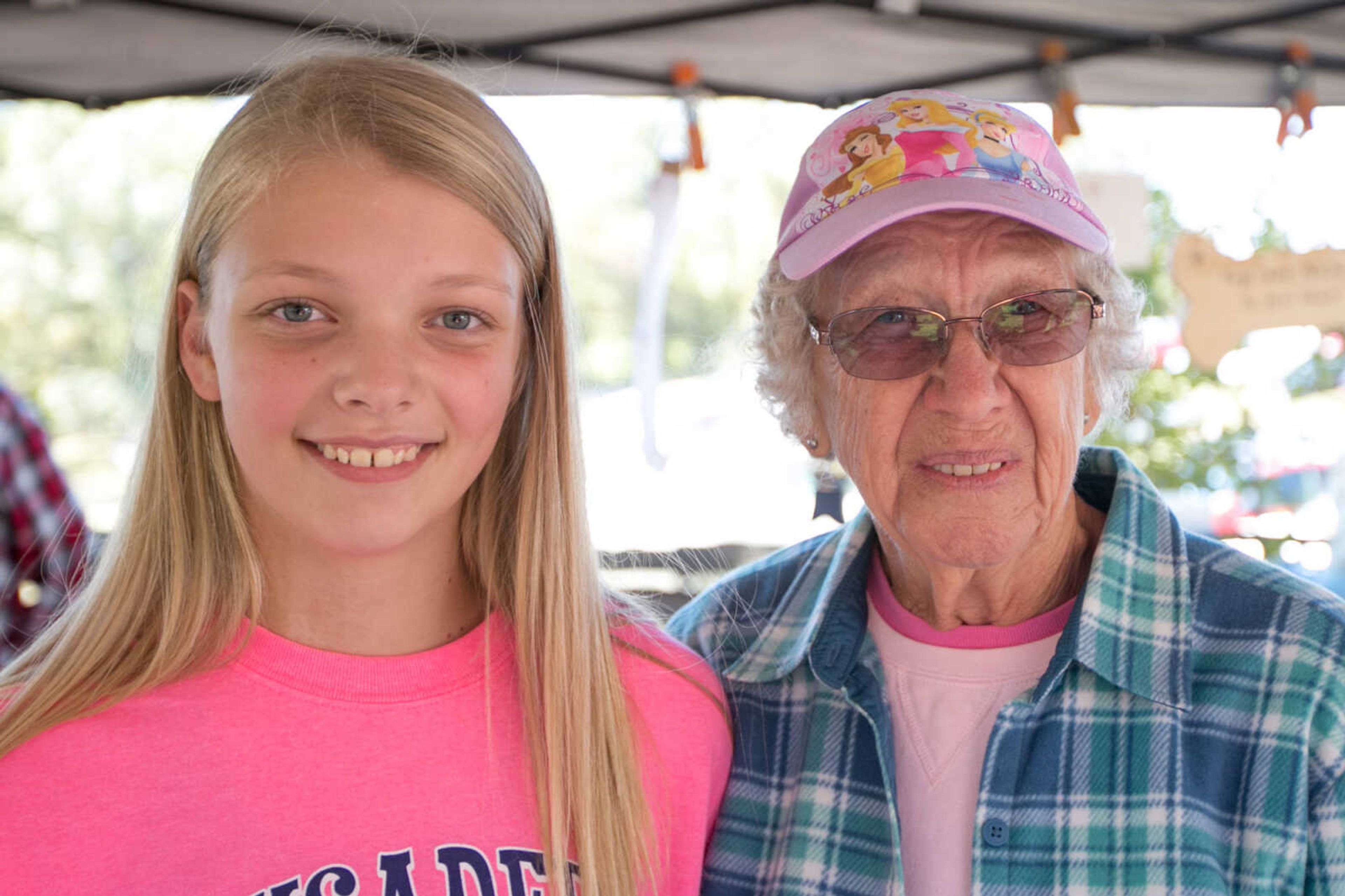 GLENN LANDBERG ~ glandberg@semissourian.com

Jordan Wunderlich, left, and Jean Moss pose for a photo during the Fall Festival at the Saxon Lutheran Memorial in Frohna, Missouri, Saturday, Oct. 10, 2015.