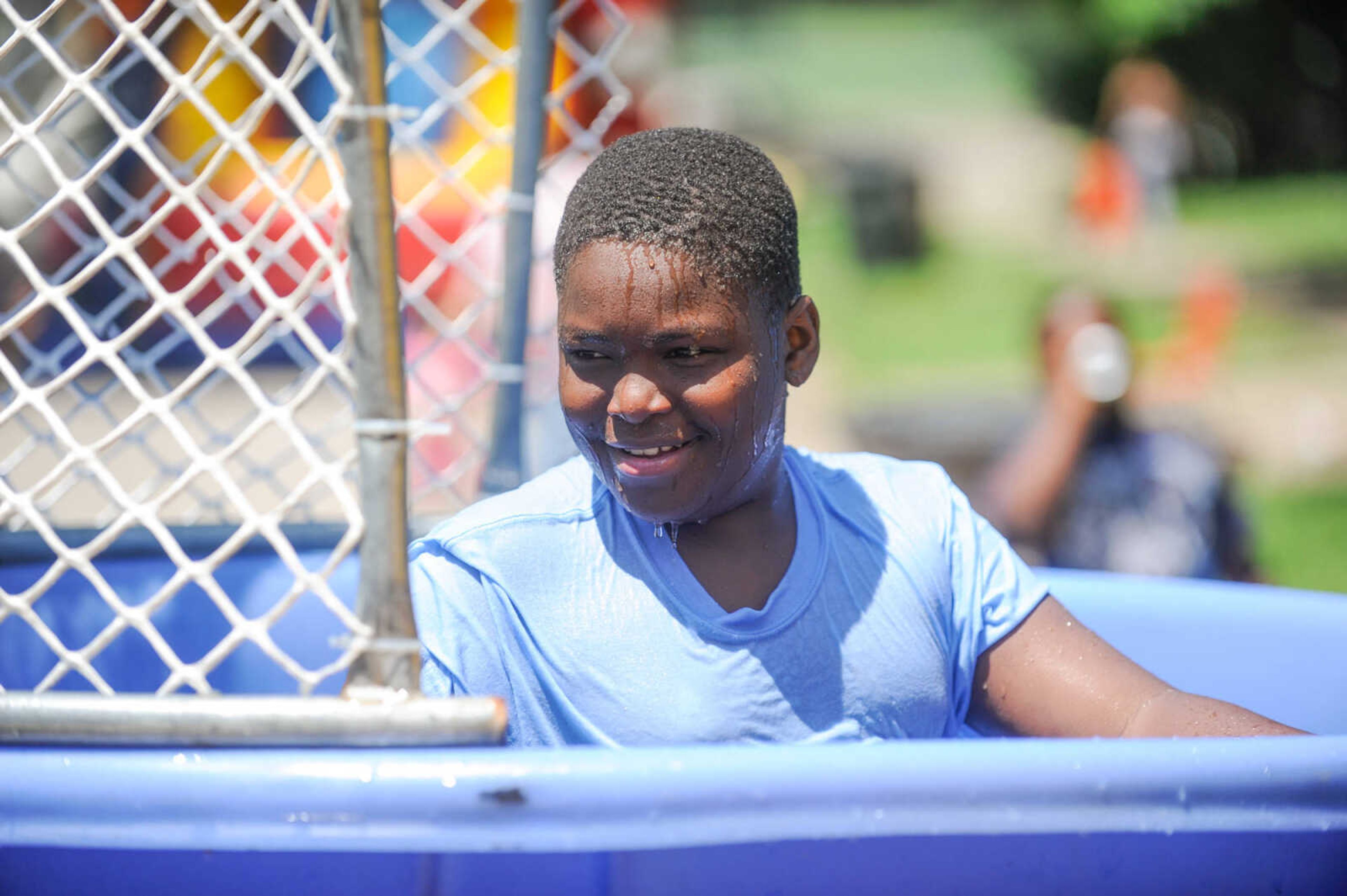 GLENN LANDBERG ~ glandberg@semissourian.com


Daniel Bird Jr. emerges from the dunk tank after splashing in during a block party in Cape Girardeau's ward 2 area, Saturday, June 20, 2015.