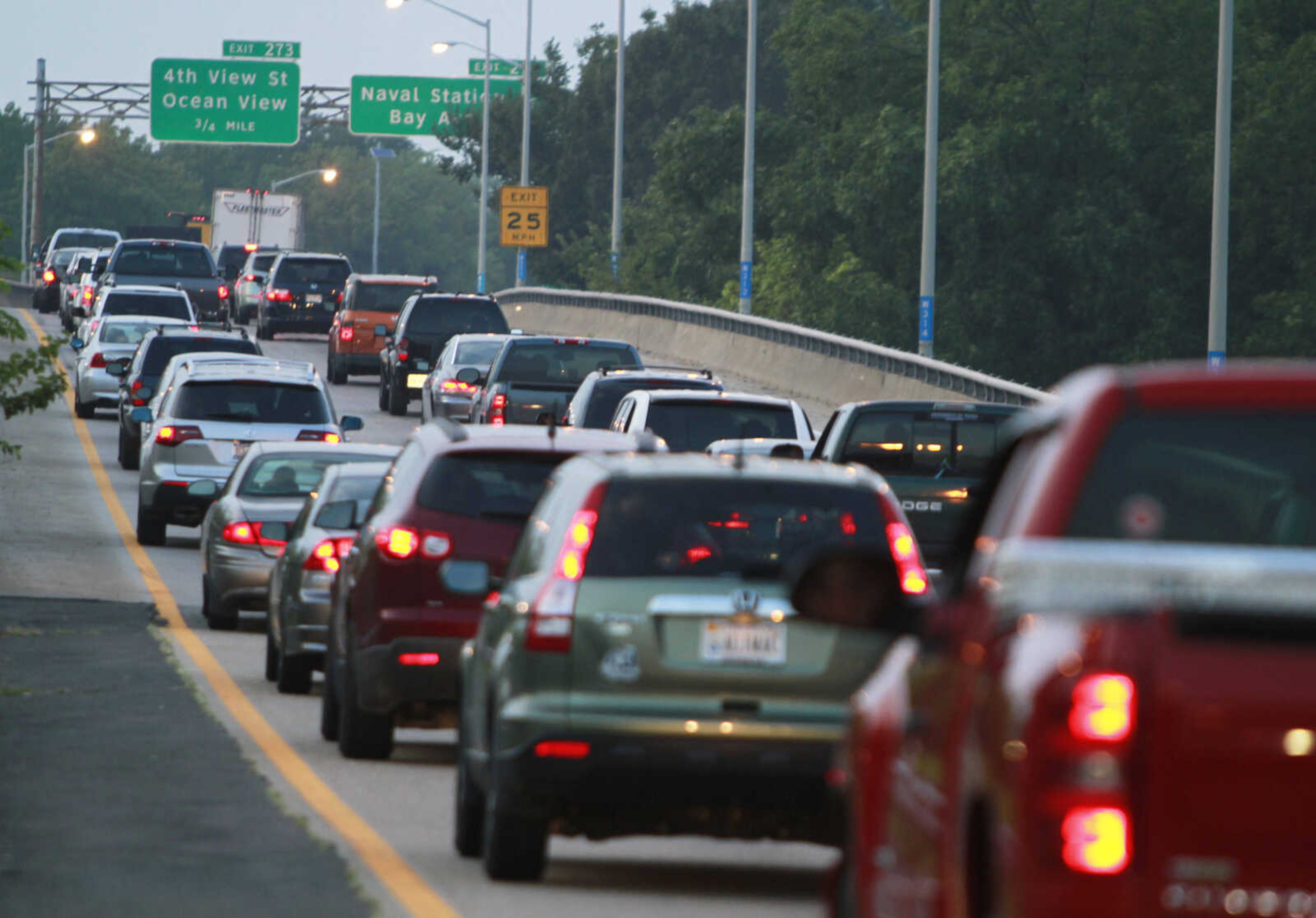 Cars clog the roadway to the Hampton Roads Bridge Tunnel as Hurricane Irene approaches, Thursday, Aug. 25, 2011, in Norfolk, Va.   Forecasters at the National Hurricane Center Thursday afternoon also issued the first warnings for the entire North Carolina coast to the Virginia border. One is also out for the coast of South Carolina from Edisto Beach north.  (AP Photo/Steve Helber)