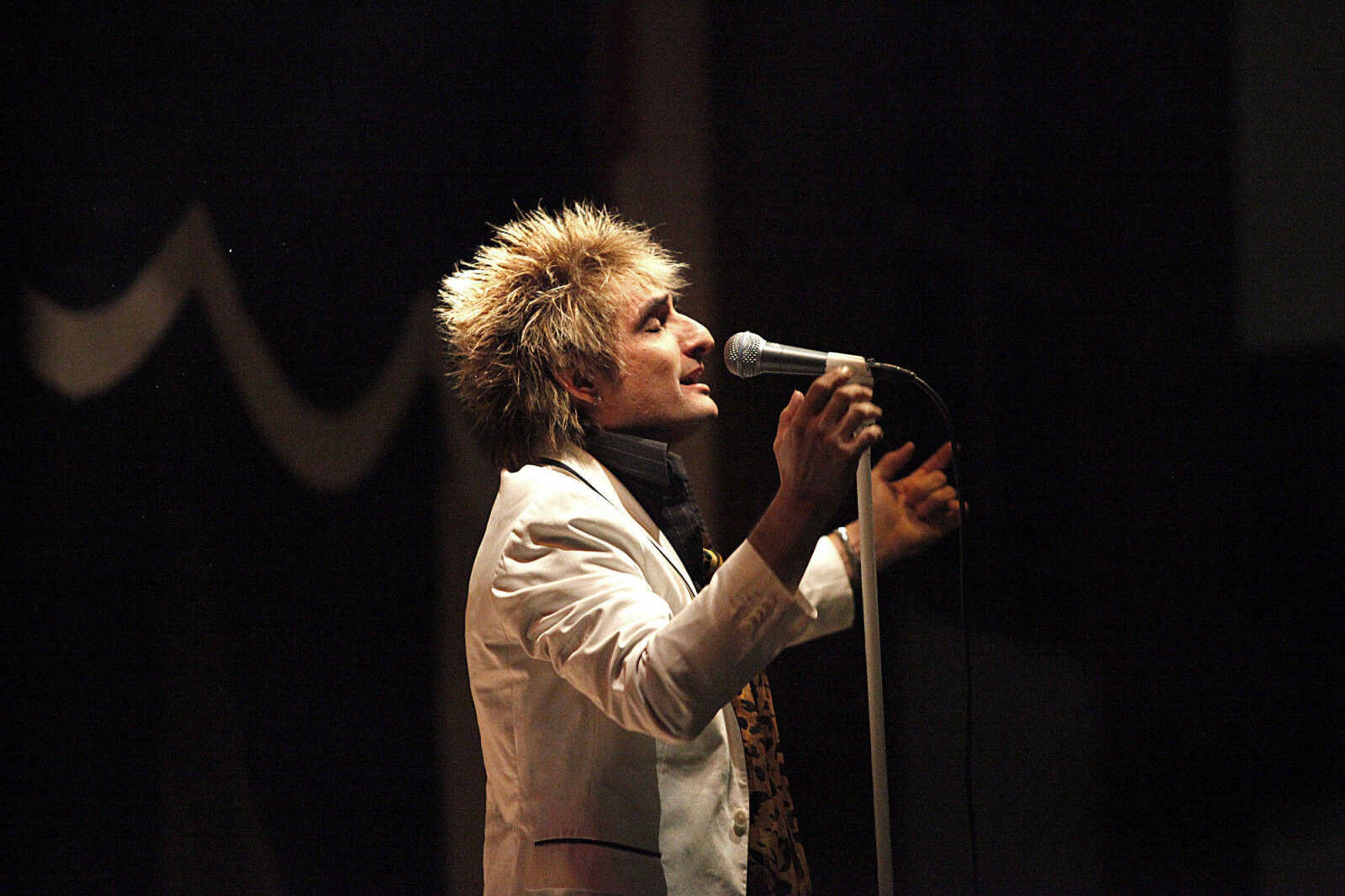 CHRIS MACKLER ~ photos@semissourian.com

Vic Vega performs as Rod Stewart during the Kiss, AC/DC and Rod Stewart Tribute Concert held at the Arena Building on Saturday, Nov. 6, 2010, in Cape Girardeau.