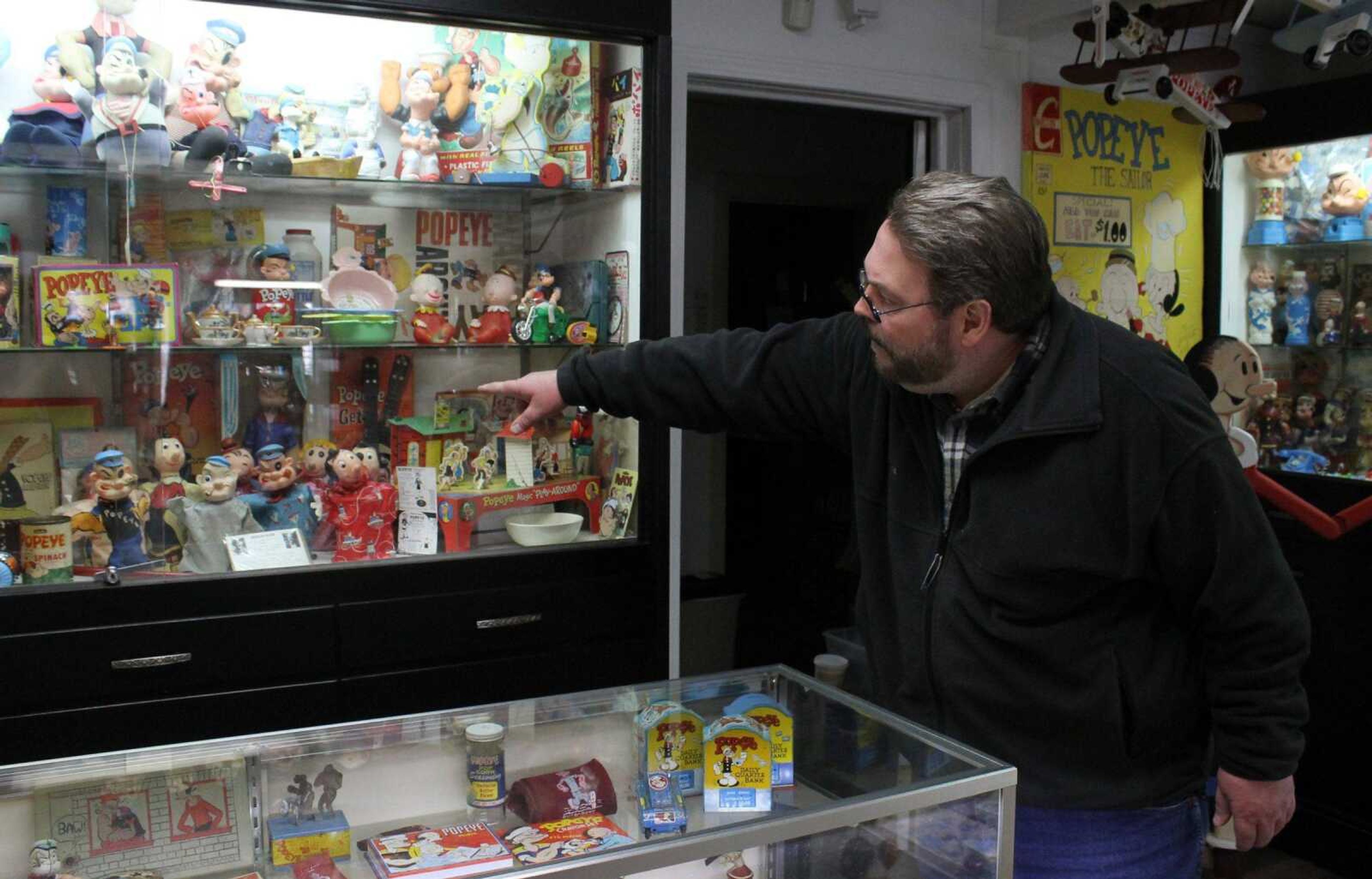 Mike Brooks, owner of Spinach Can Collectibles in Chester, Ill., has more than 2,000 items on display. His shop and mini-museum are located in the historic Chester Opera House, whose former owner served as the inspiration for Popeye's hamburger-scarfing friend Wimpy.