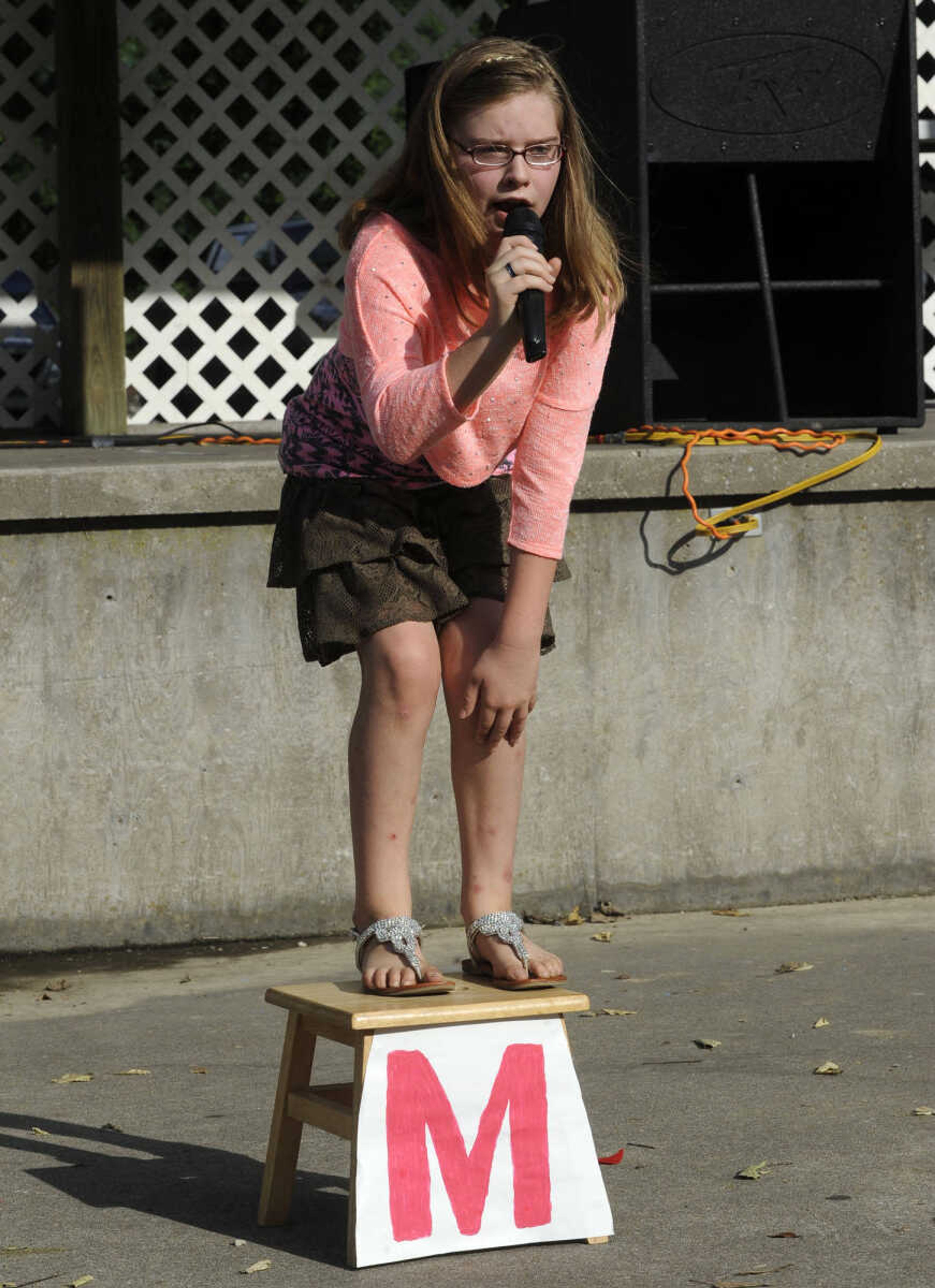 FRED LYNCH ~ flynch@semissourian.com
Tori Burger performs "Naughty" in the Heartland Talent Showcase at German Days on Saturday, Aug. 9, 2014 at Frisco Park in Chaffee, Missouri.