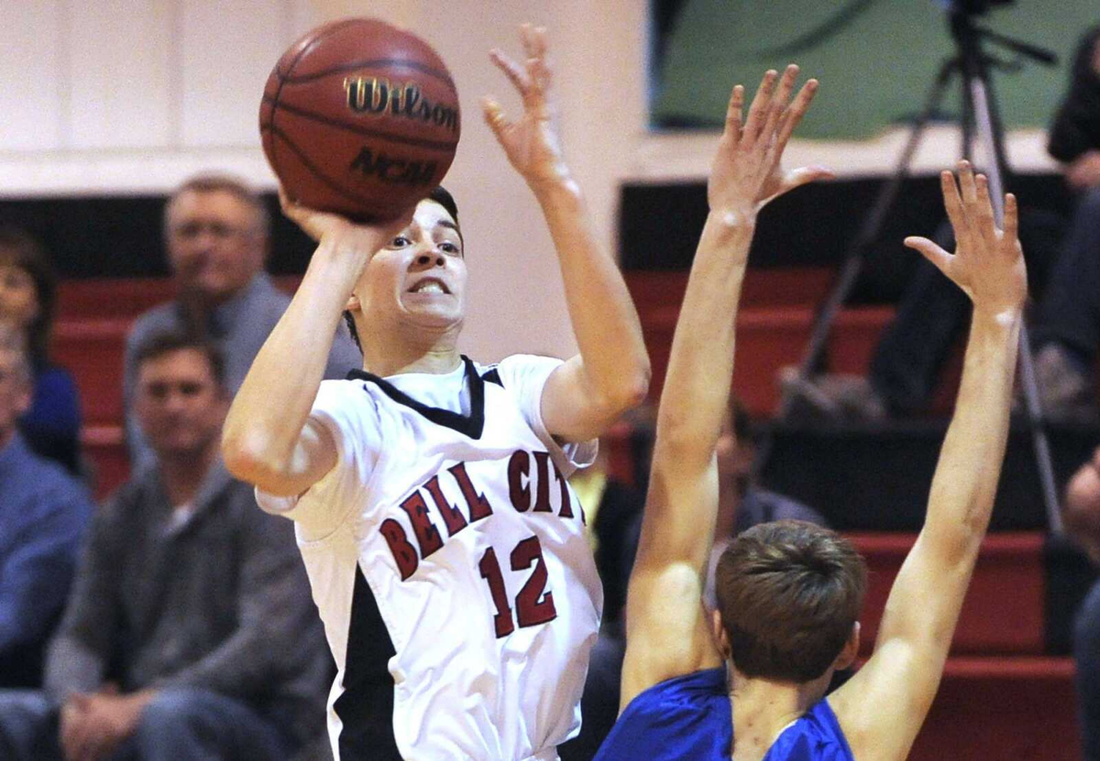 Bell City's Cole Nichols puts up a shot over Oran's Max Priggel that Bobby Wright put back for the final score in the Cubs  63-62 victory Friday, Feb. 5, 2016 in Bell City, Missouri.