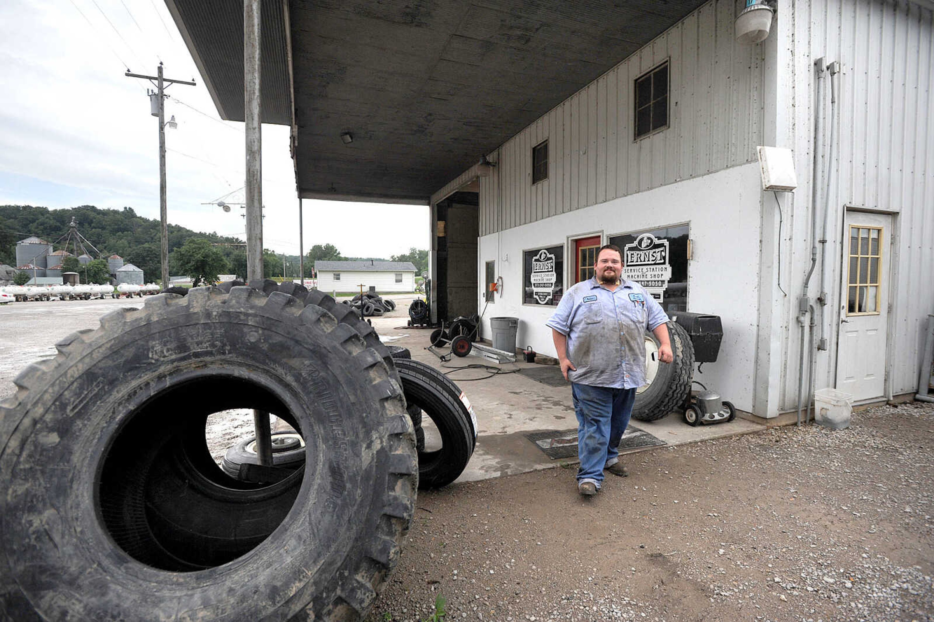 LAURA SIMON ~ lsimon@semissourian.com

Nathan Ernst, operator of Ernst Service Station and Machine Shop, was a junior in high school when the Bois Brule Bottoms were flooded by a levee break around 2 a.m. on July 25, 1993. He remembers that the water took about 14 hours to begin flooding the small farming community of McBride. Knowing the flood was coming, all residents could do was Ňhurry up and wait,Ó he said. 
ŇIt was slow, like somebody went and left on a garden hose,Ó Ernst said of floodwaters that encroached the town.
Despite damage to the shop and service station once owned and operated by his grandfather and father before him, the family wasnŐt willing to give up living and working in the Bois Brule Bottoms. A high watermark, over 15 feet off the ground, is still visible today on the underside of an awning attached to the shop. 
Many residents, following the sandbagging and other flood-fighting efforts in July 1993 and the months following, Ernst said, would gather for Ňbeer parties,Ó to help keep their spirits up while facing the unknown. Many had spent their day transporting sandbags into McBride with a borrowed tugboat and barge.
ŇThere was a lot done, but also there was only so much you could really do,Ó Ernst said. ŇYou knew you might lose everything no matter what.Ó