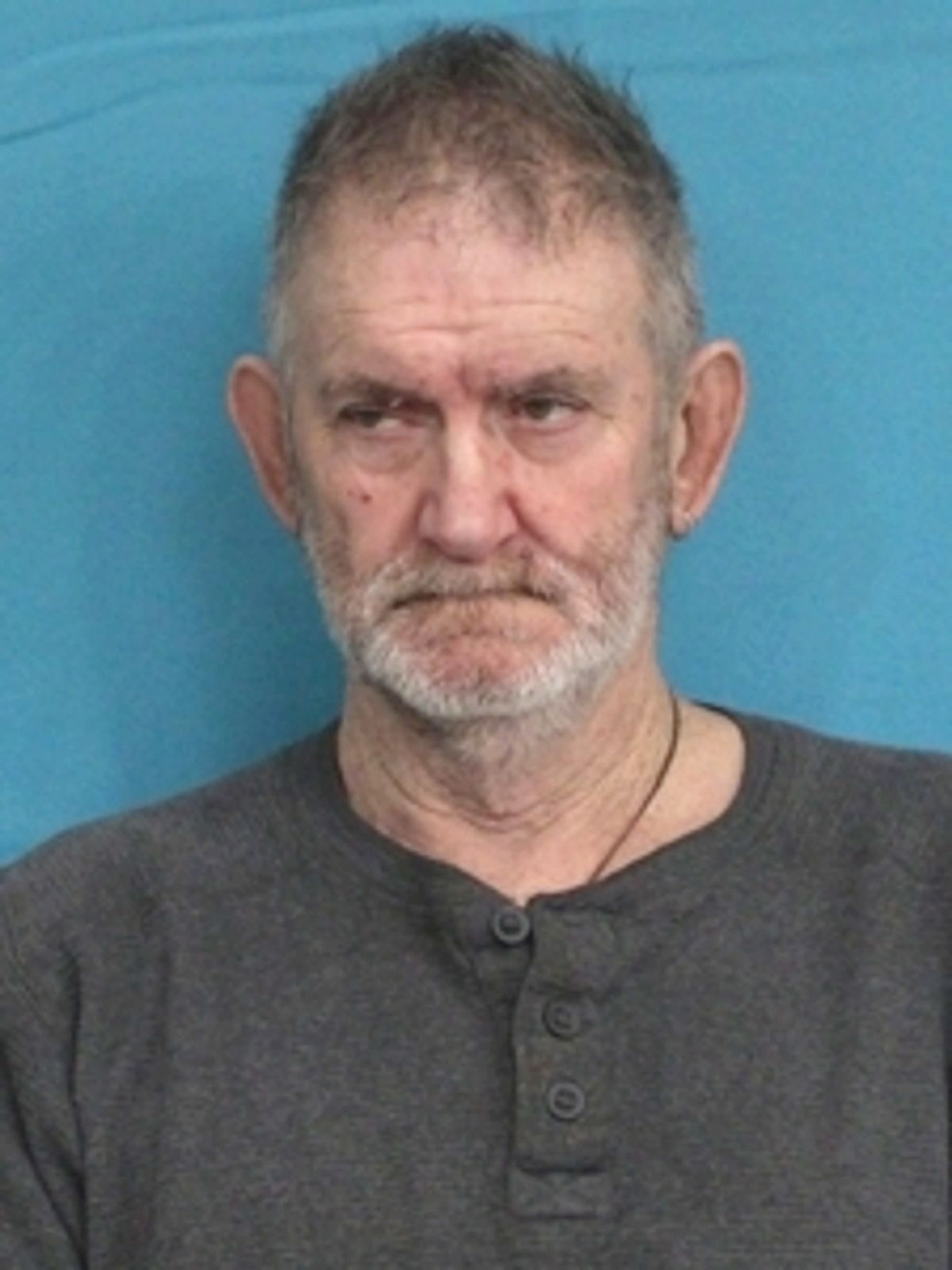Jackson man arrested after human remains found near burn pit