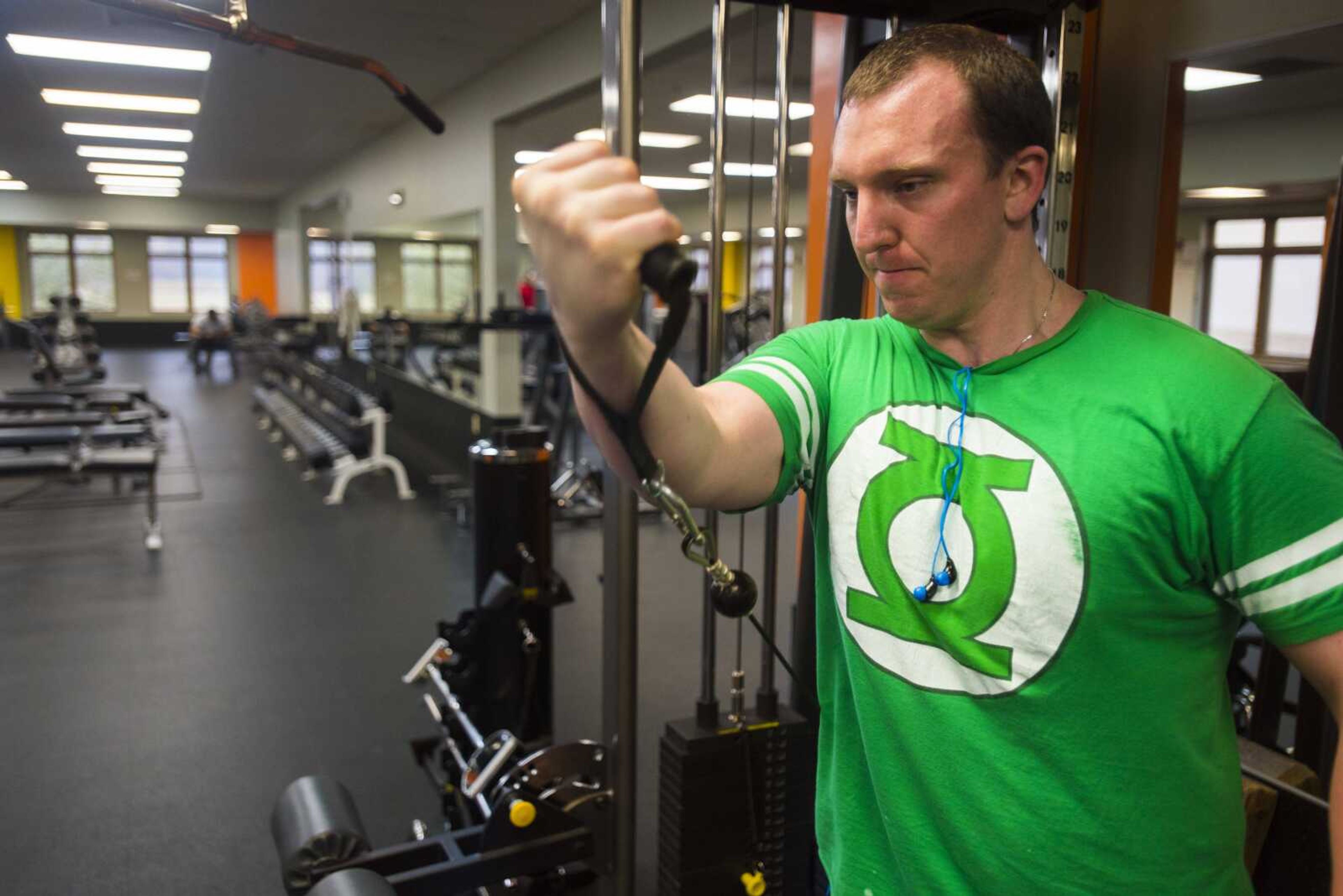 Cape Girardeau Police Department patrol officer David Weidenbenner works out at the Osage Centre during his day off from work Monday in Cape Girardeau. Local police officers soon will have access to their own training facility in the department's new, nearly-completed headquarters in Arena Park.