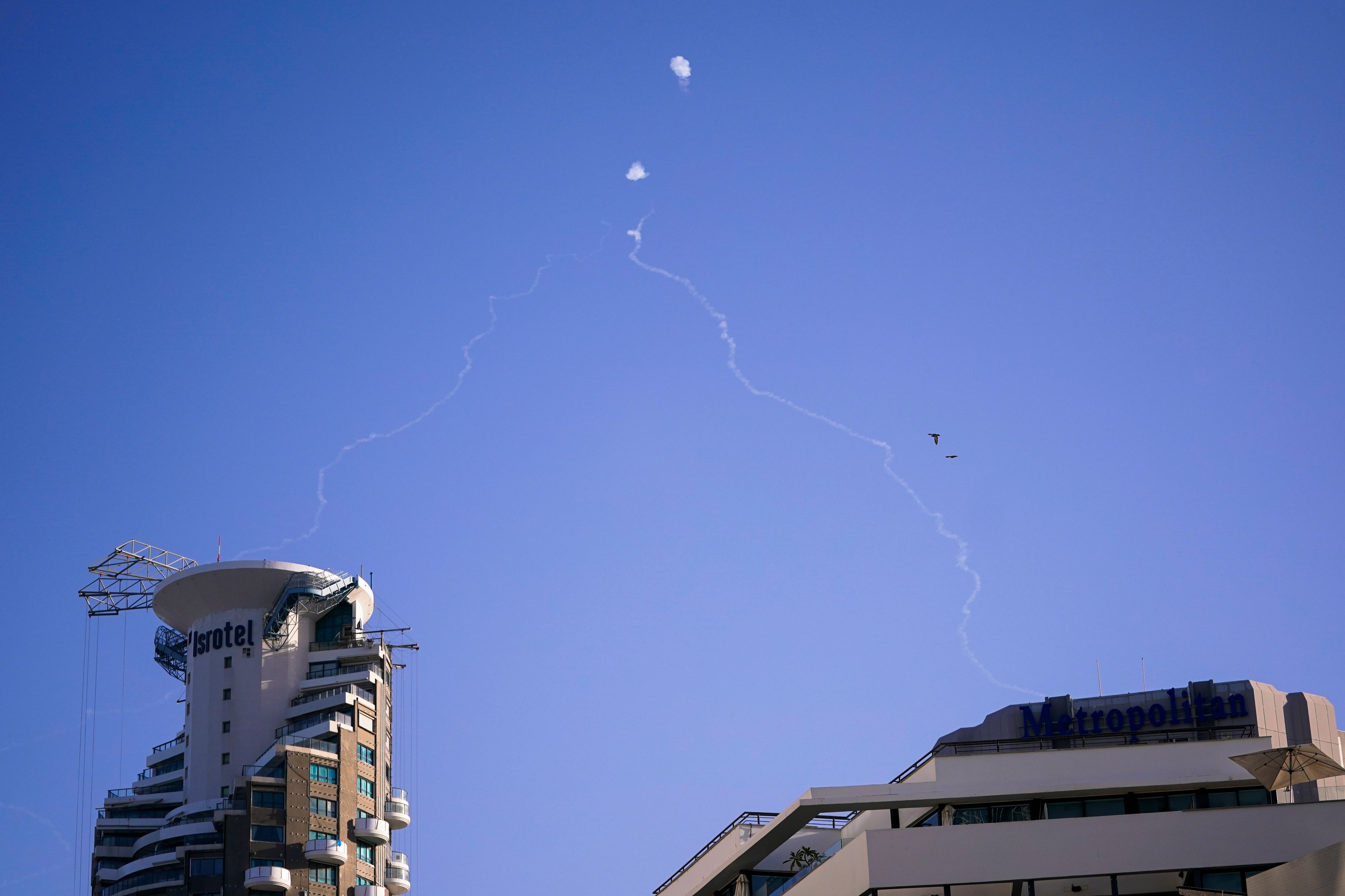 Israel's Iron Dome anti-missile system fires to intercept as air raid sirens sound in Tel Aviv, Wednesday, Oct. 23, 2024. (Nathan Howard/Pool Photo via AP)