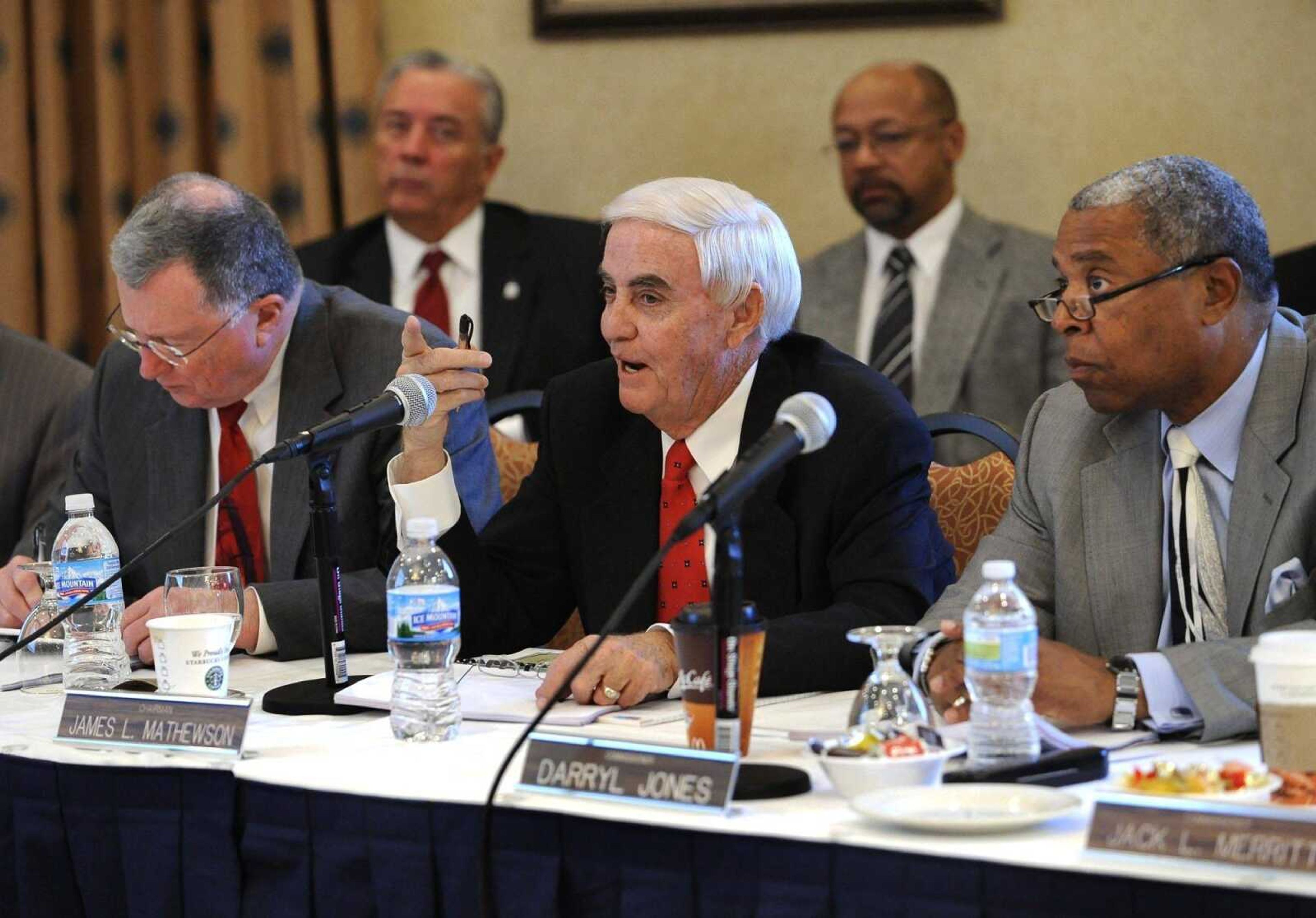 Missouri Gaming Commission chairman Jim Mathewson asks a question during a presentation by Isle of Capri executives Wednesday, Oct. 20, 2010 in Jefferson City, Mo. Commissioners Noel Shull, left, and Darryl Jones listen. (Fred Lynch)