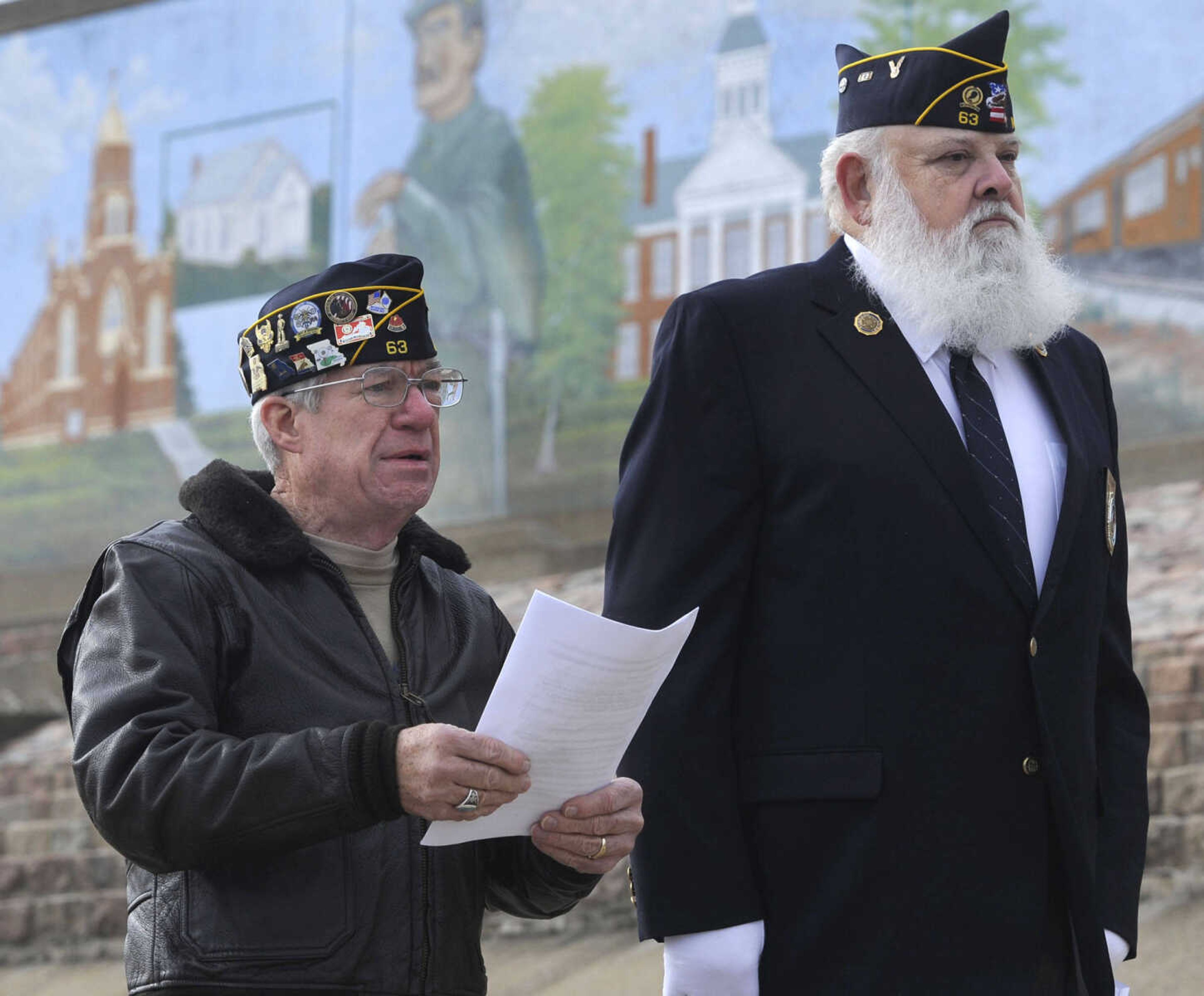 Gary Bridges, left, leads a program with Roy Rhodes at the annual American Legion Post 63 Pearl Harbor observance Sunday, Dec. 7, 2014 in Cape Girardeau.