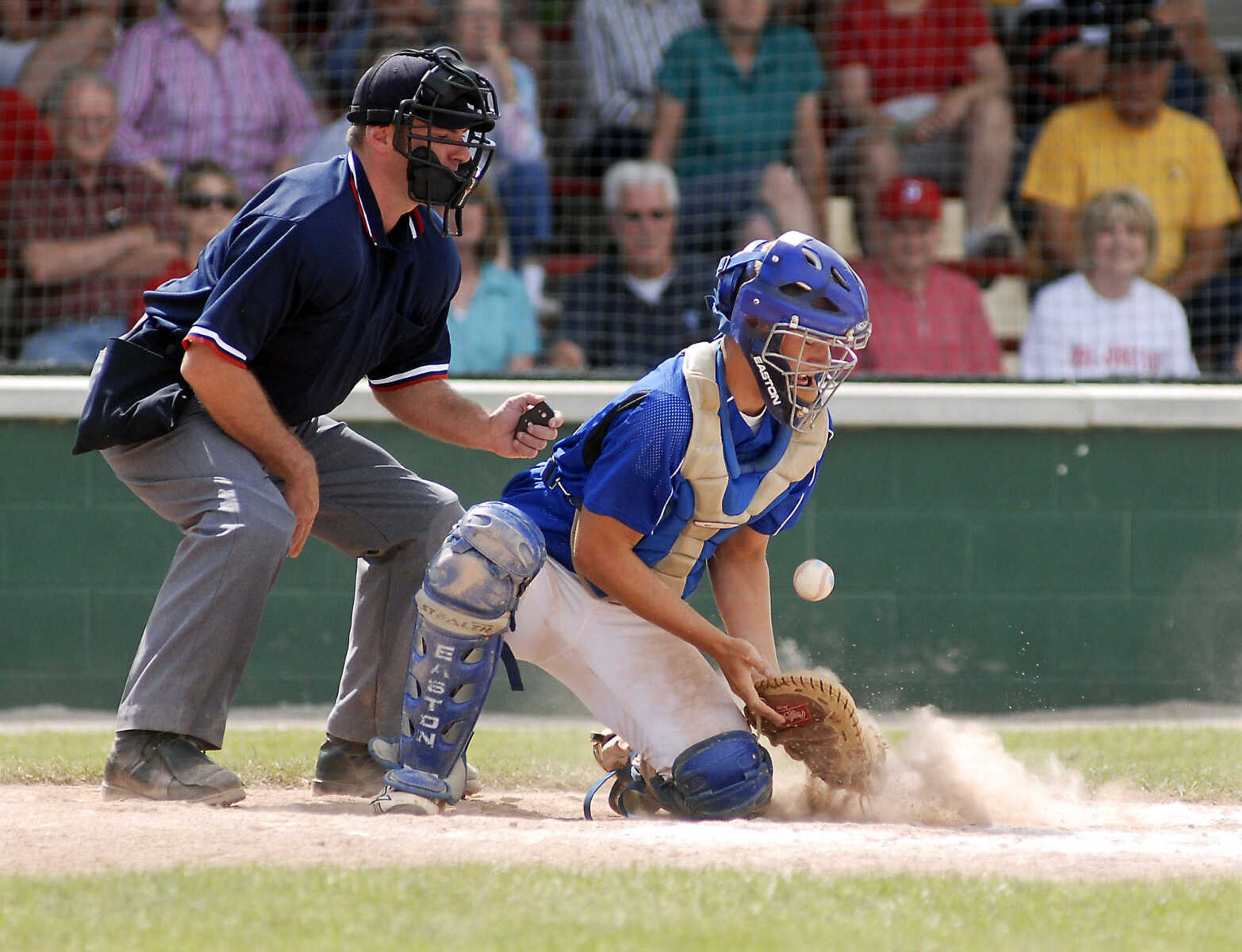 JUSTIN KELLEY photo
Notre Dame catcher Mark Hagedorn blocks the ball during the Class 3 championship game Saturday, June, 6 2009, against Carl Junction at Meador Park in Springfield.