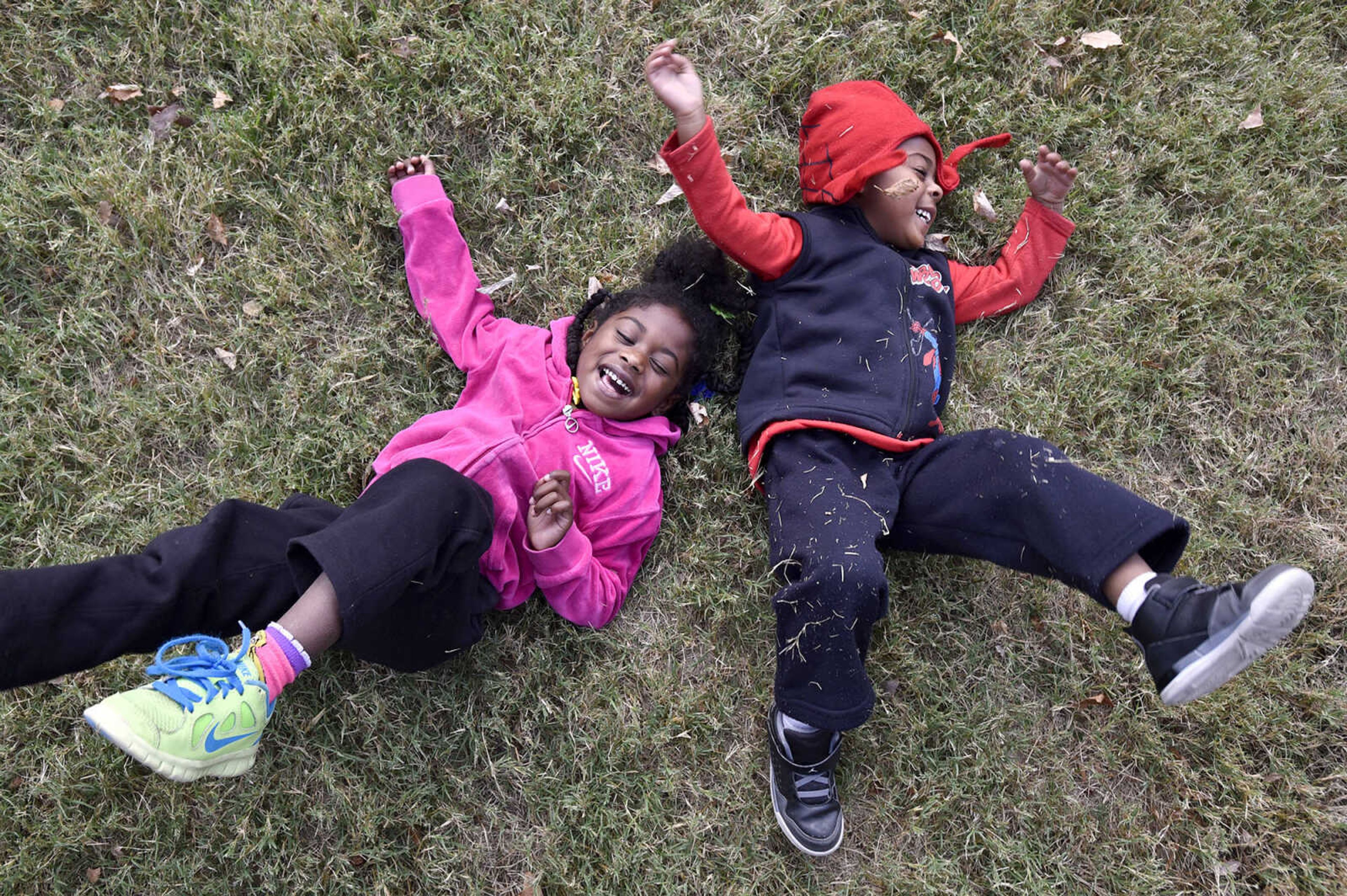 LAURA SIMON ~ lsimon@semissourian.com

Serenity Jones, left, and Justice Jones roll around the lawn of the Cape Girardeau County Courthouse in Jackson on Monday, Nov. 7, 2016.