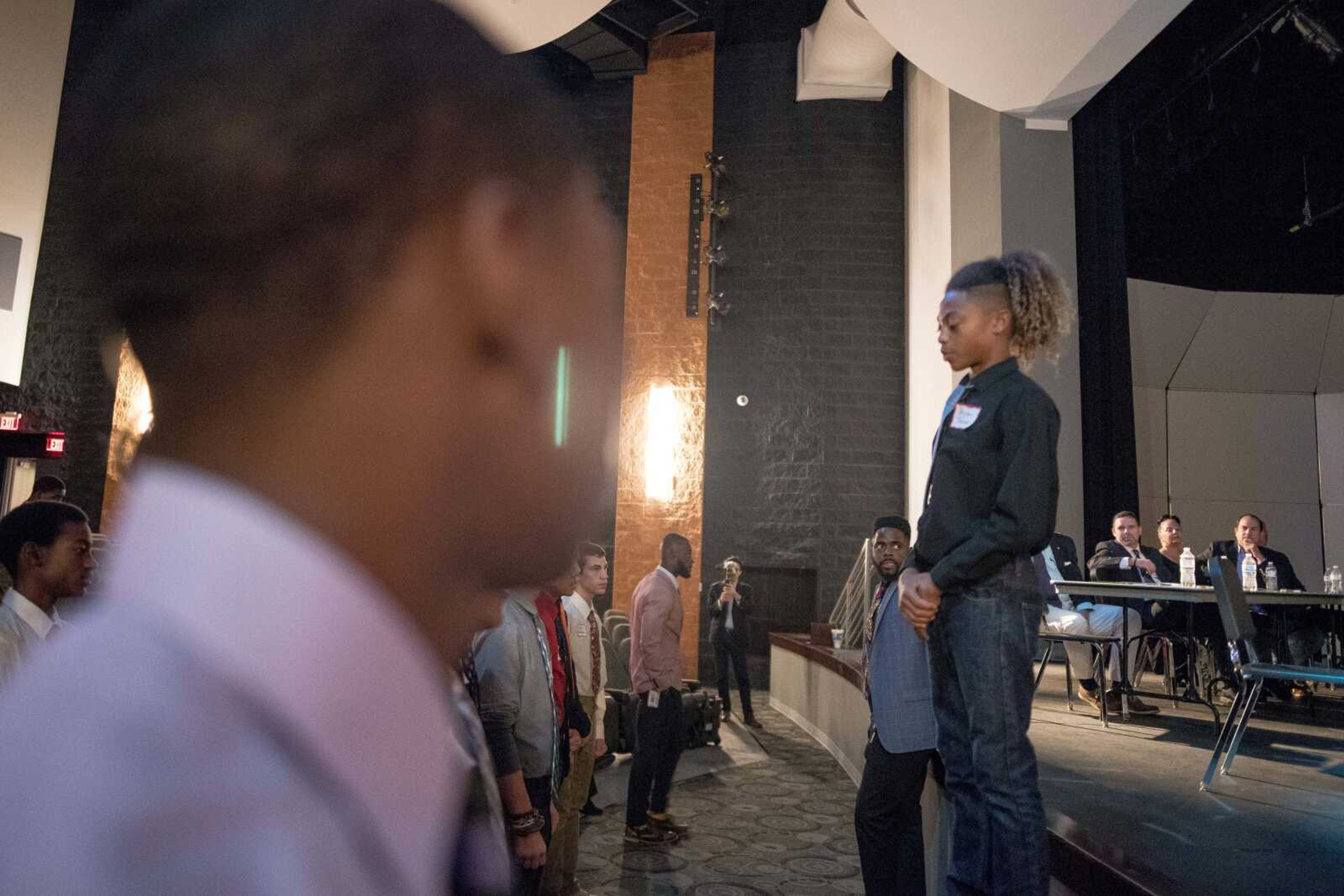 Honorable Young Men Club member Bryson Thomas, 14, leads his peers in the recitation of "G Code," a communal commitment to values including integrity and respect during a visit from regional politicians and members of the Missouri state legislature's black caucus Friday, Oct. 25, 2019, at Cape Central High School.