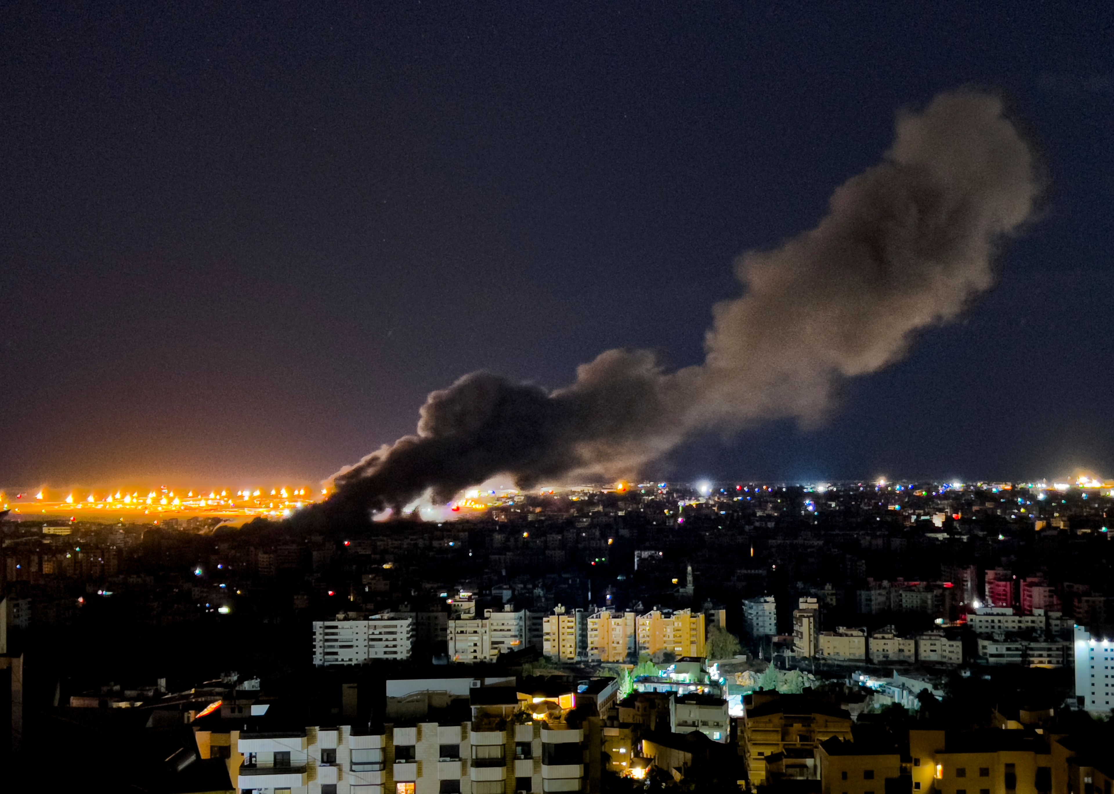 Smoke rises from an Israeli airstrike that hit the southern suburb of Beirut, Lebanon, Tuesday, Oct. 1, 2024. (AP Photo/Hussein Malla)