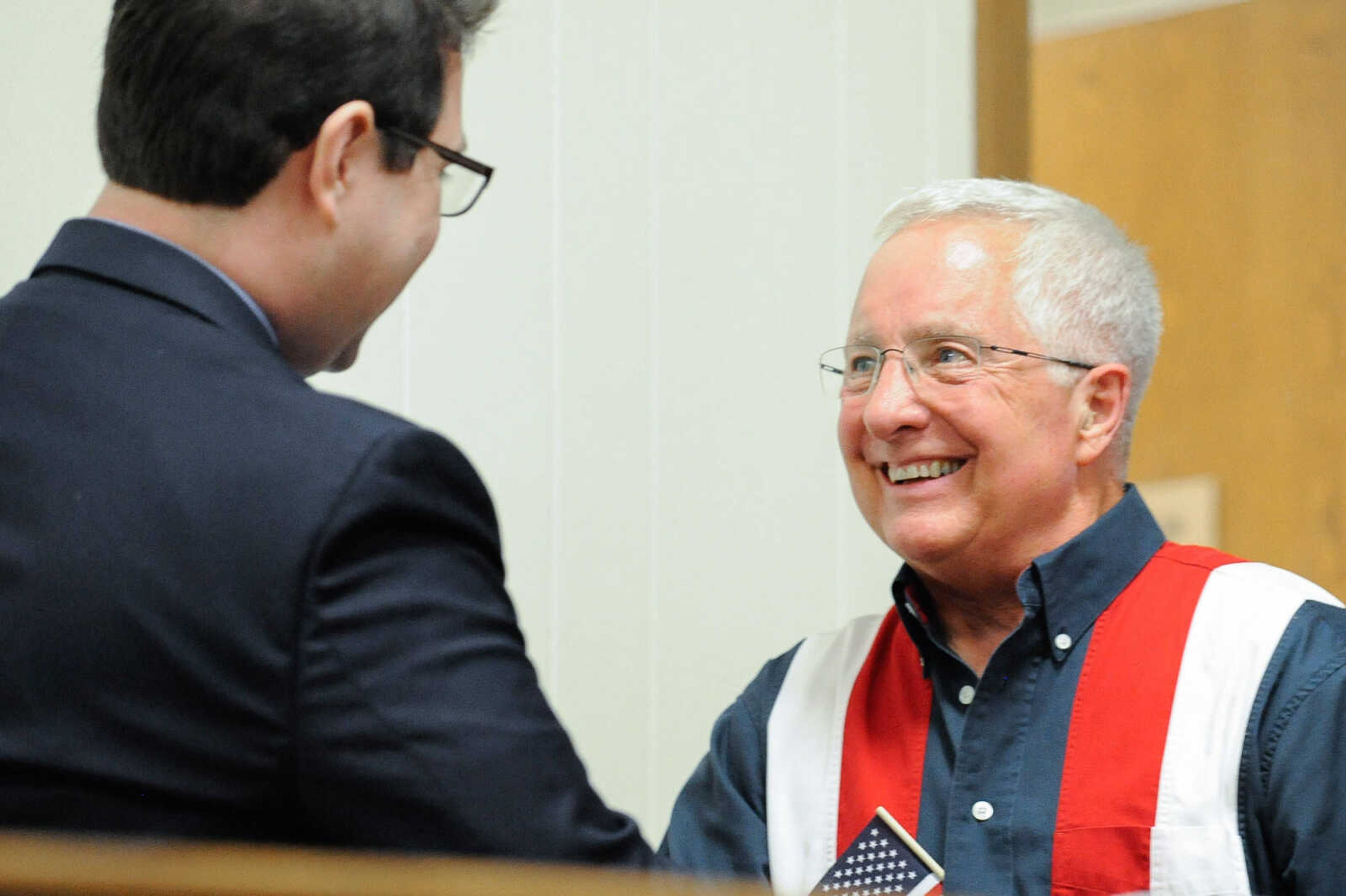 GLENN LANDBERG ~ glandberg@semissourian.com

Lucas Presson, general manager of rustmedia introduces James D. Bollinger, the 2016 Spirit of America award winner during the award ceremony Monday, July 4, 2016 at the Common Pleas Courthouse in Cape Girardeau.