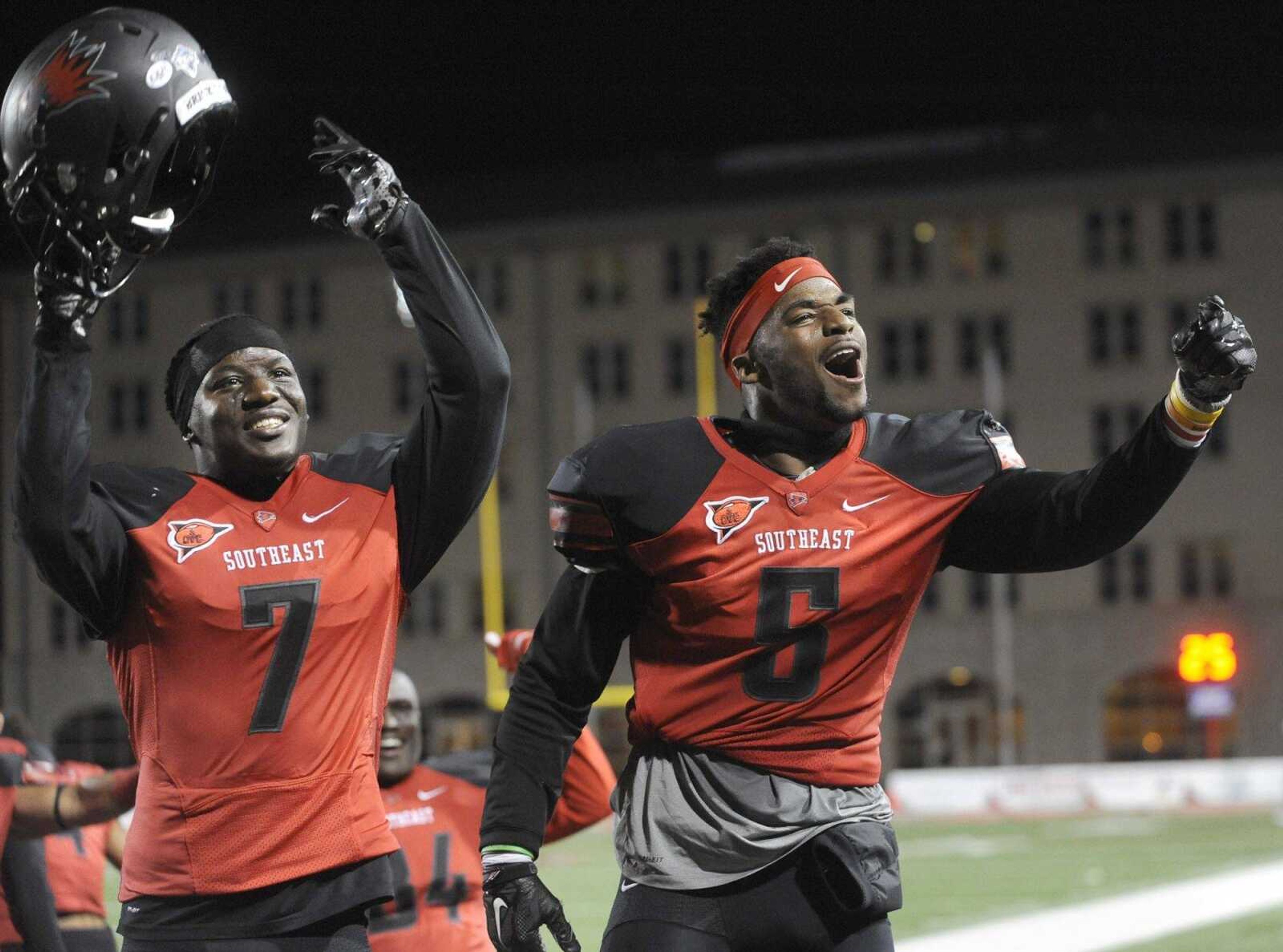 Peter Lloyd, left, and Eriq Moore celebrate with teammates after their 27-10 victory over Murray State on Saturday at Houck Stadium. (Fred Lynch)