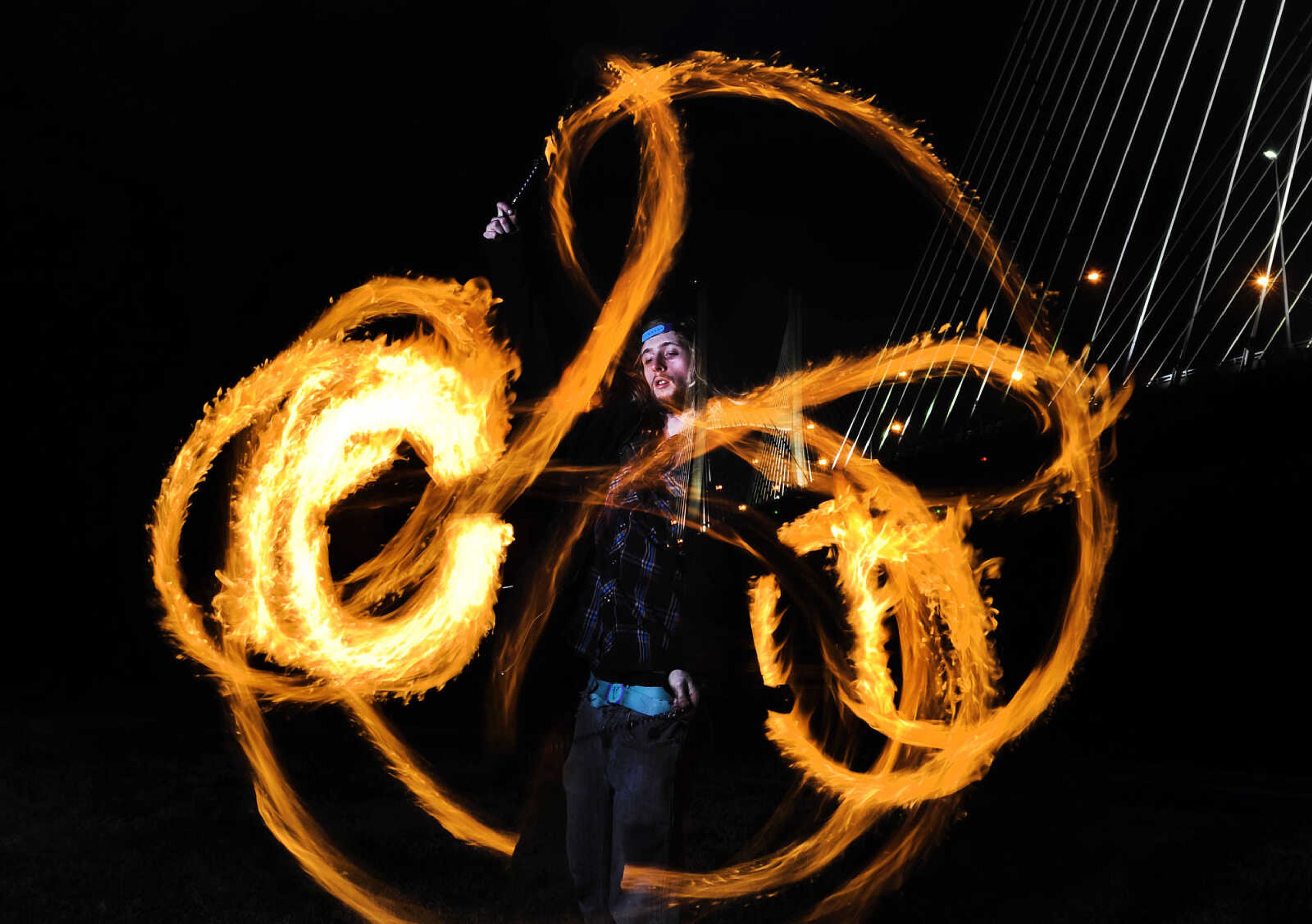 LAURA SIMON ~ lsimon@semissourian.com

Sky Smith demonstrates his fire poi skills in Cape Girardeau.