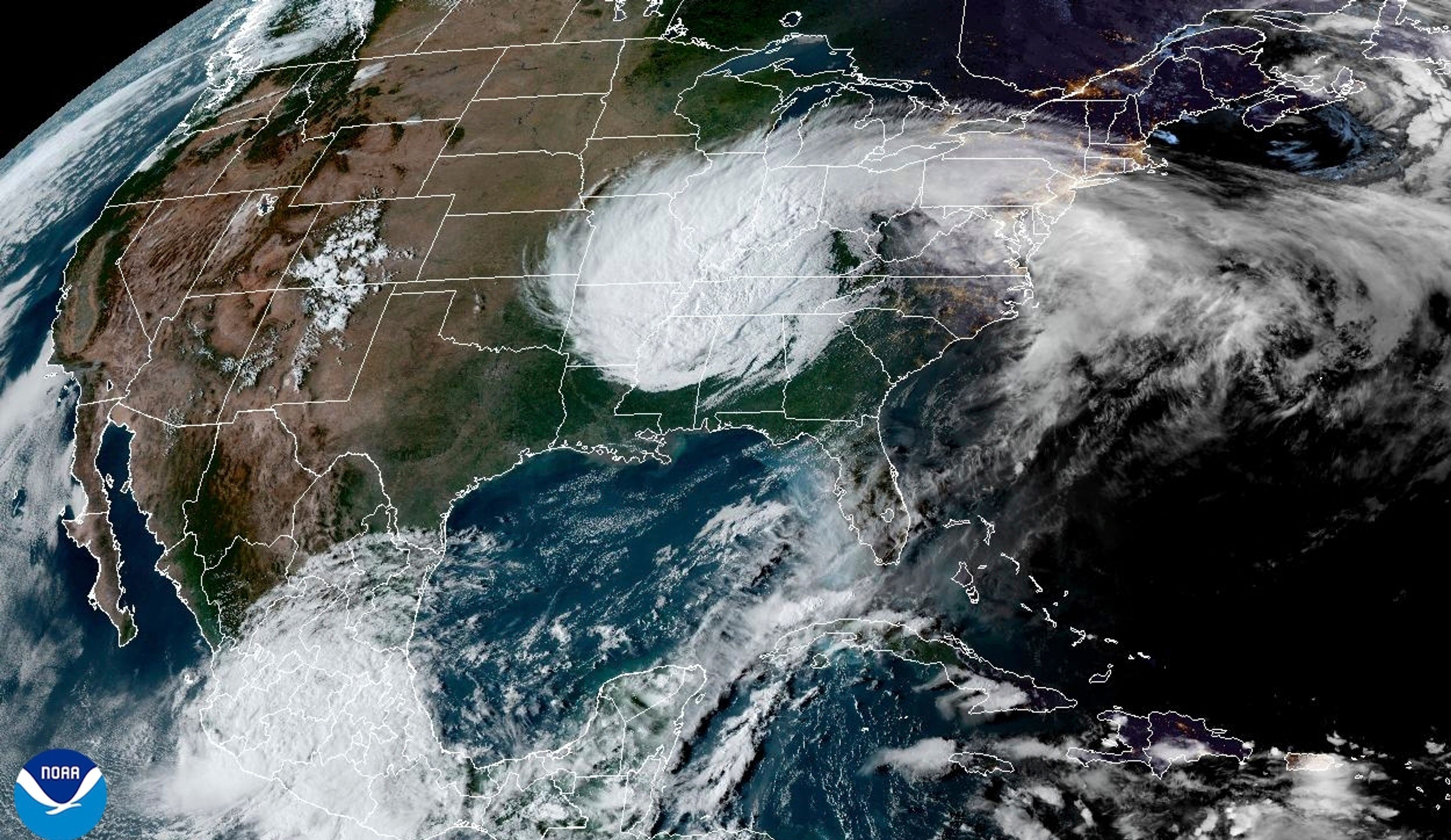 This satellite image from the National Oceanic and Atmospheric Administration taken at 6:11pm ET shows Hurricane Helene, which weakened into a post-tropical cyclone, over the United States on Friday, Sept. 27, 2024. (NOAA via AP)