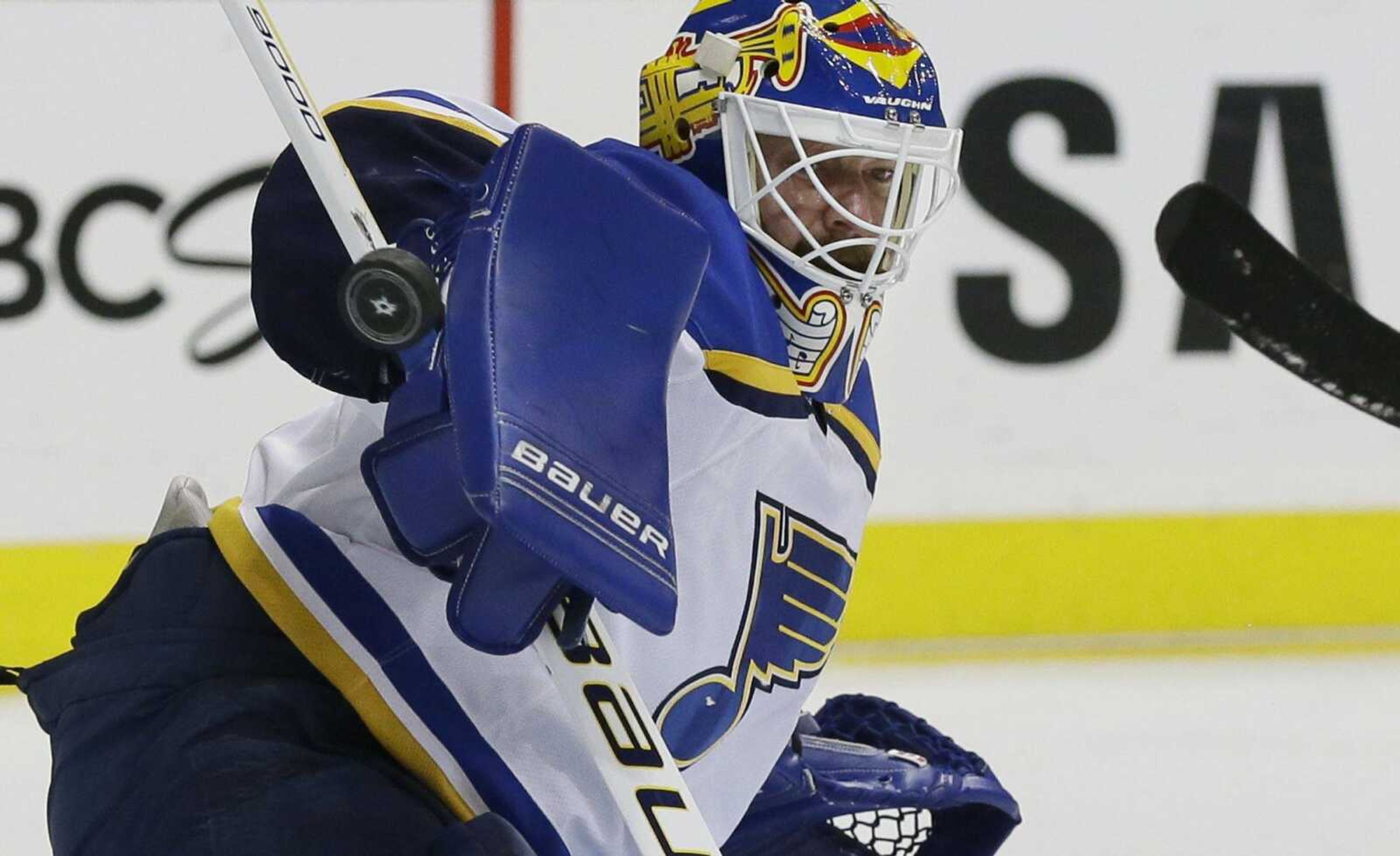 Blues goalie Brian Elliott deflects the puck during the first period in Game 5 of the Western Conference semifinals against the Stars on Saturday in Dallas.