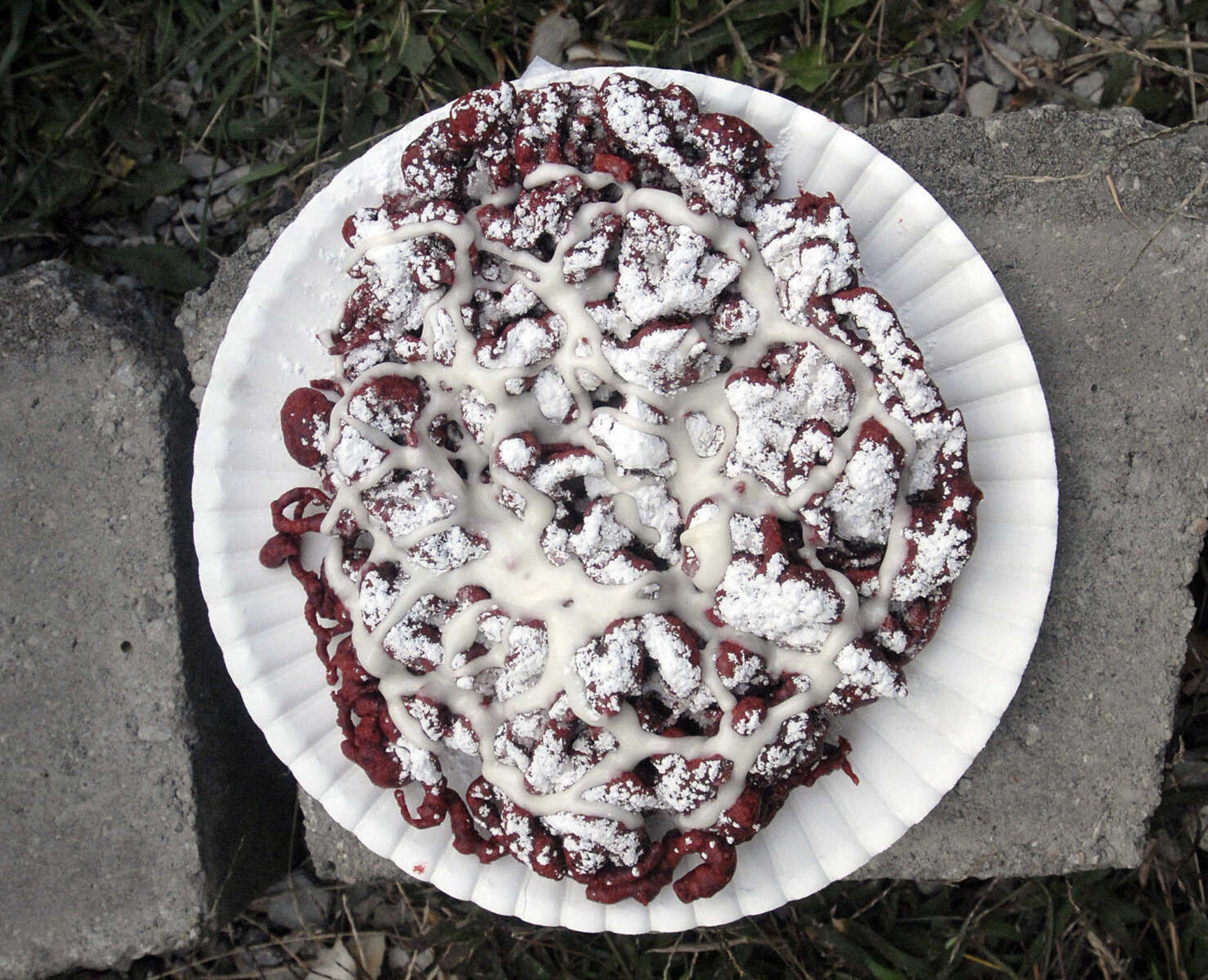 LAURA SIMON ~ lsimon@semissourian.com
Red velvet funnel cake Saturday, September 17, 2011 during the final day of the SEMO District Fair at Arena Park in Cape Girardeau.