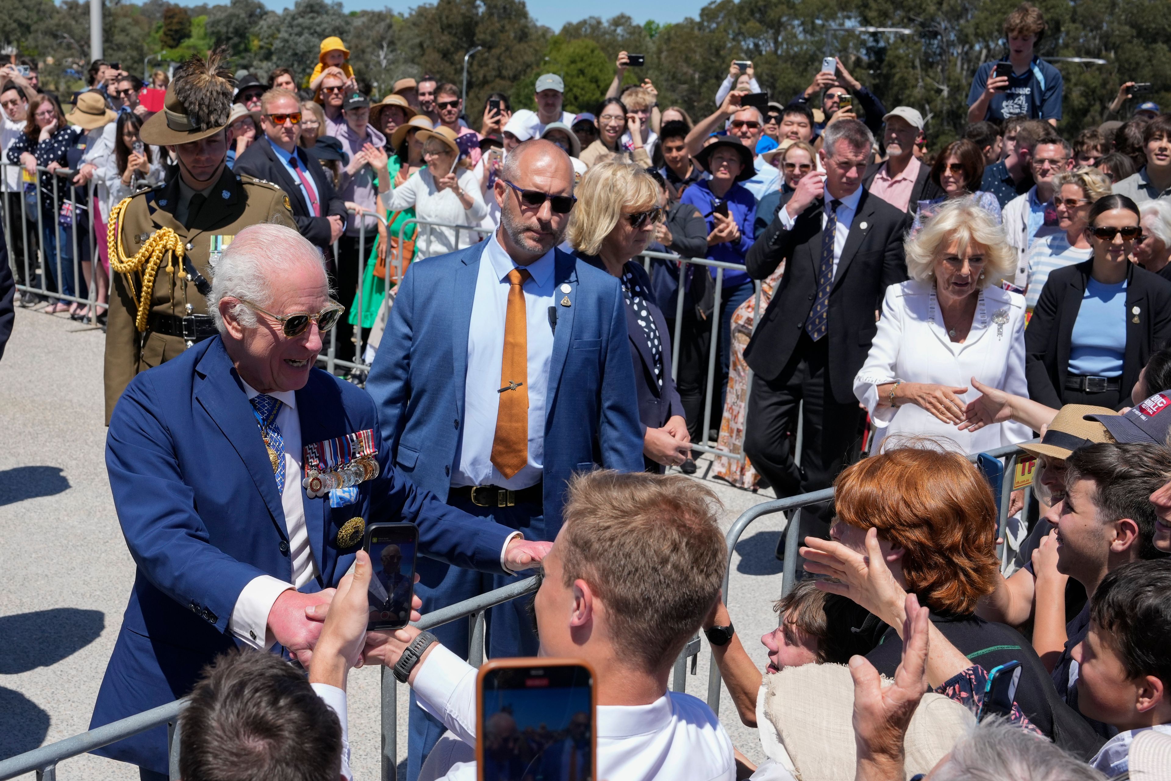 Britain's King Charles III, and Queen Camilla greets by public at the Australian War Memorial in Canberra, Monday, Oct. 21, 2024. (AP Photo/Mark Baker, Pool)